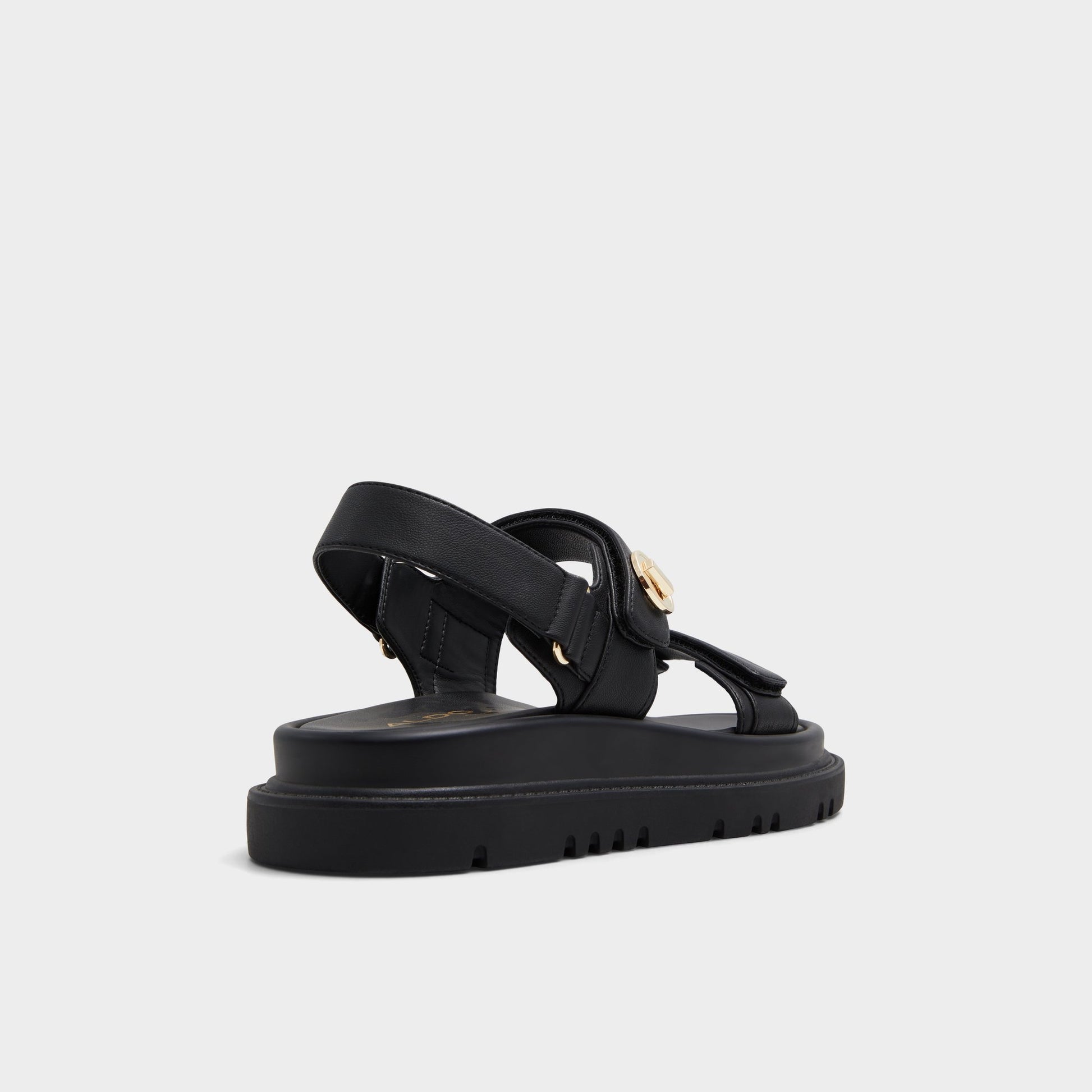 Three-quarter angle of Black Linette Footbed sandal's back side