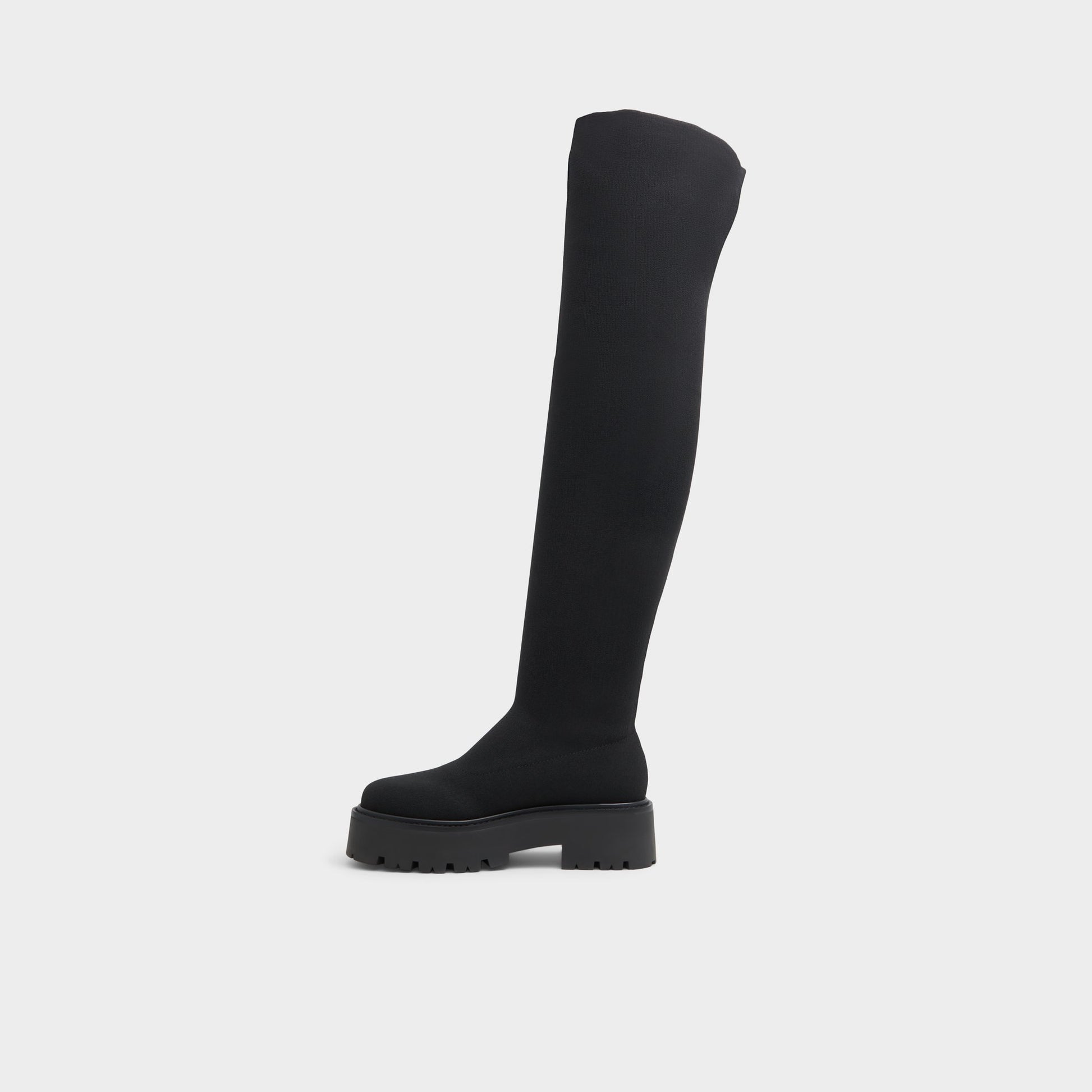 Side view of Black Dynoknit Over-the-knee boot