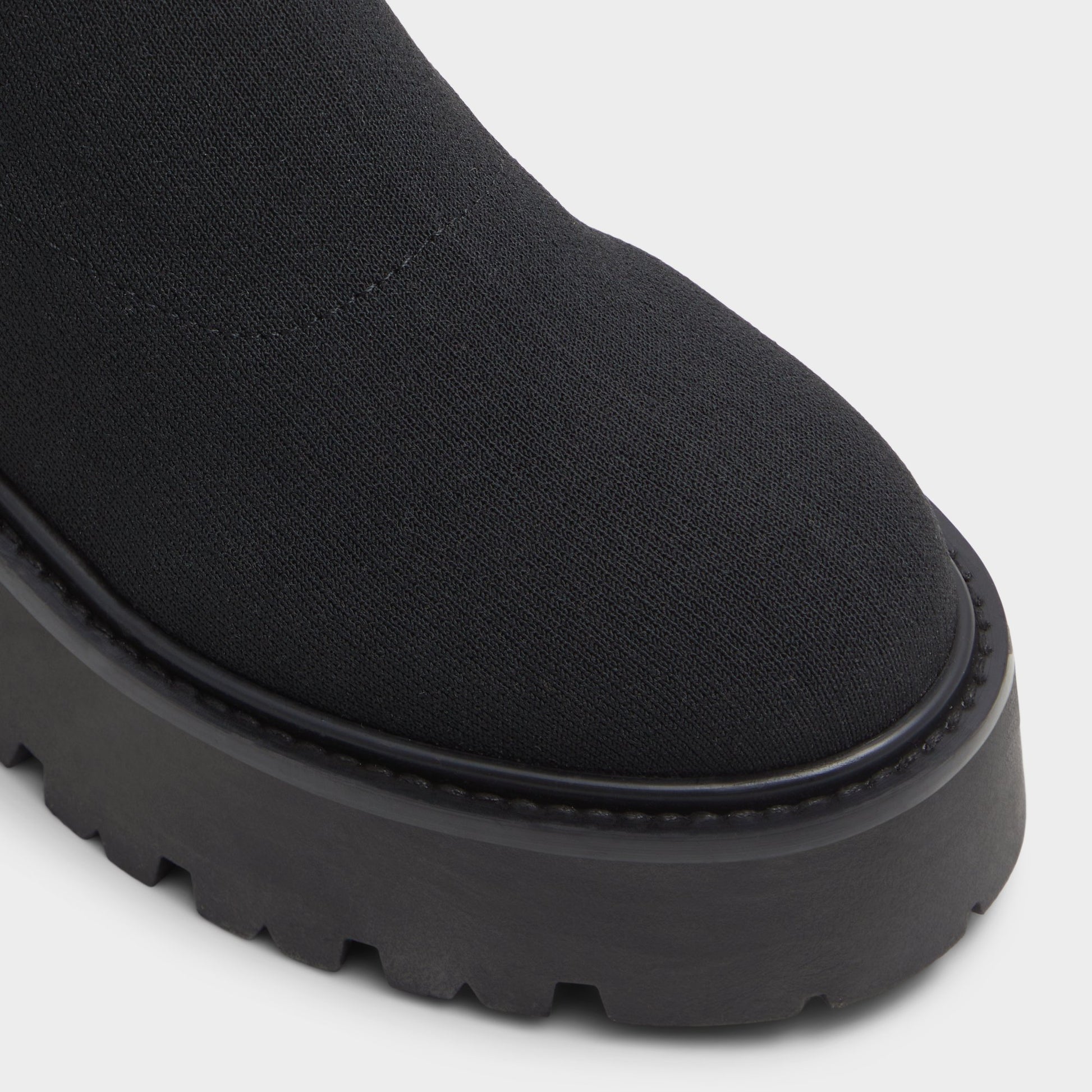 Close-up of the Black Dynoknit Over-the-knee boot