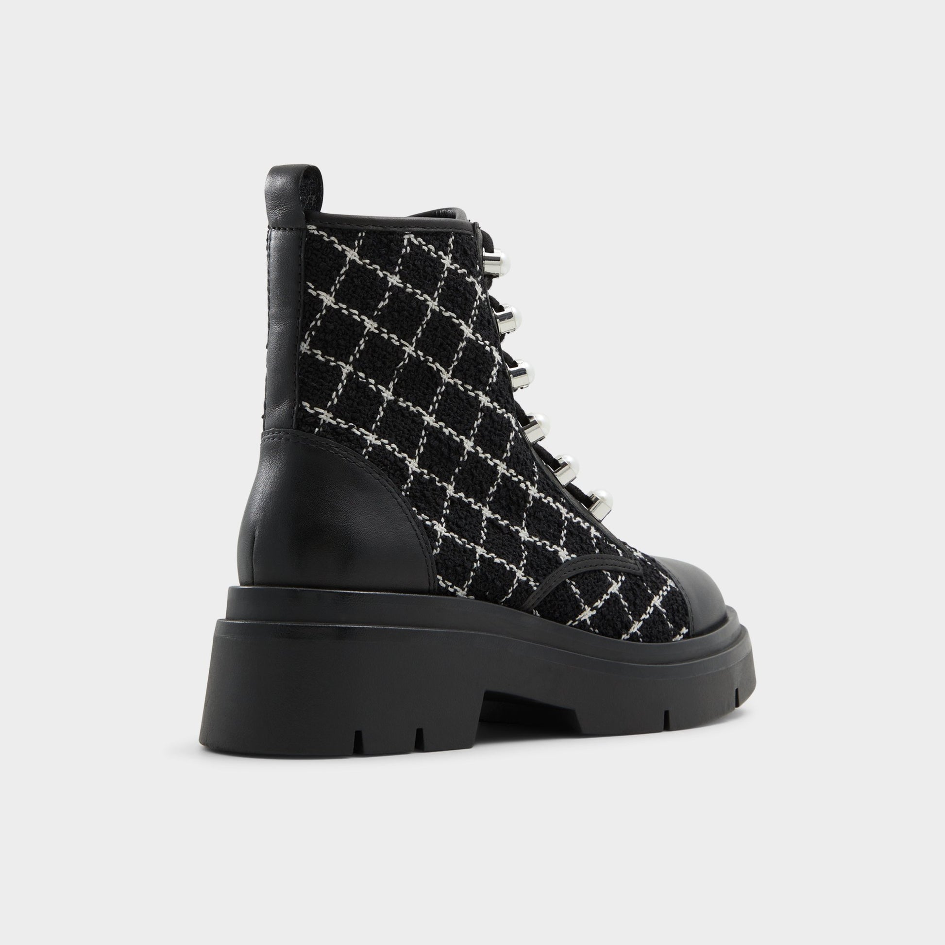 Three-quarter angle of Other Black Marthia Combat ankle boot's back side