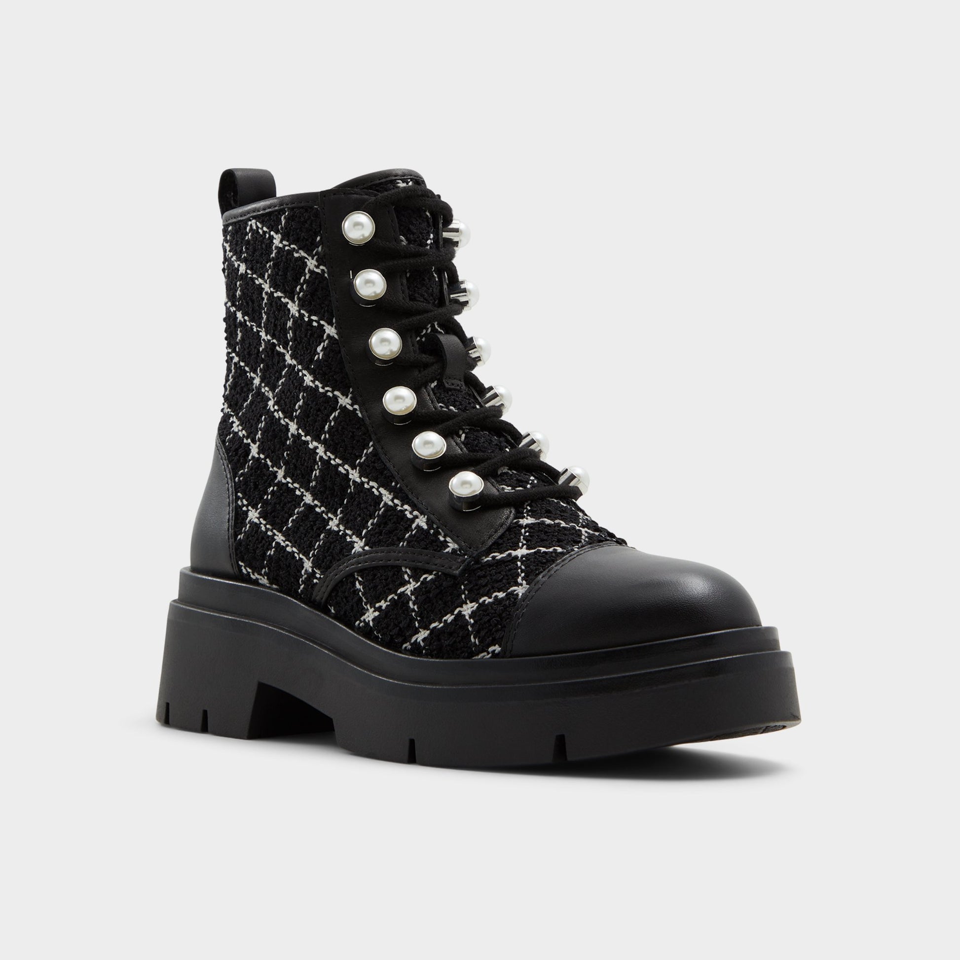 Three-quarter angle of Other Black Marthia Combat ankle boot's front side