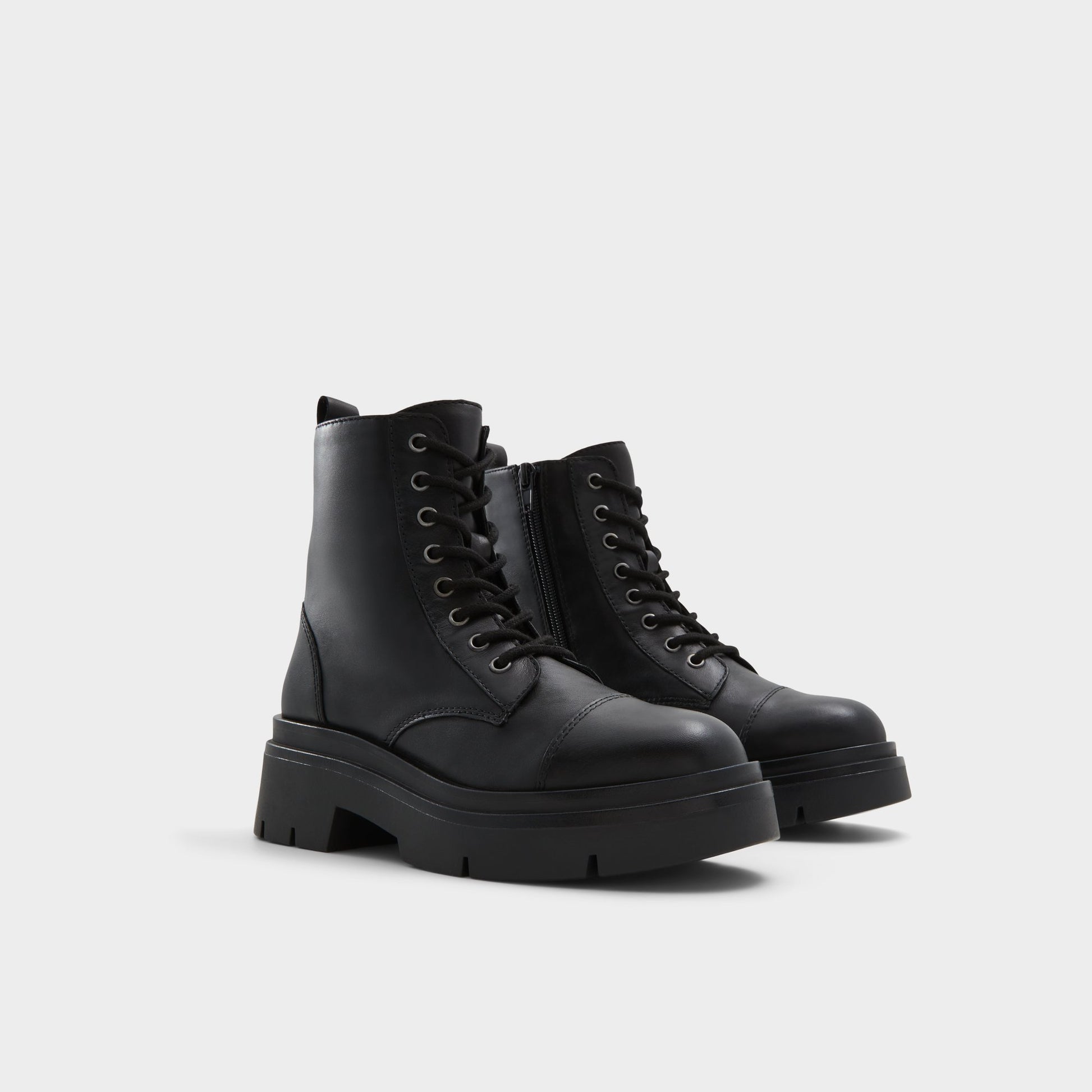 Highlighted view of a pair of Other Black Marthia Combat ankle boots