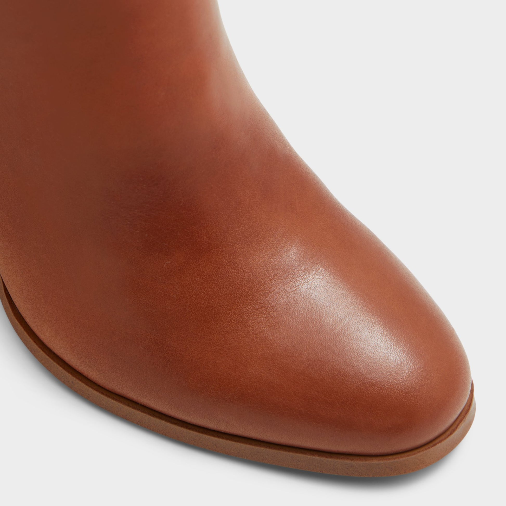 Close-up of the Cognac Belide Knee-high boot