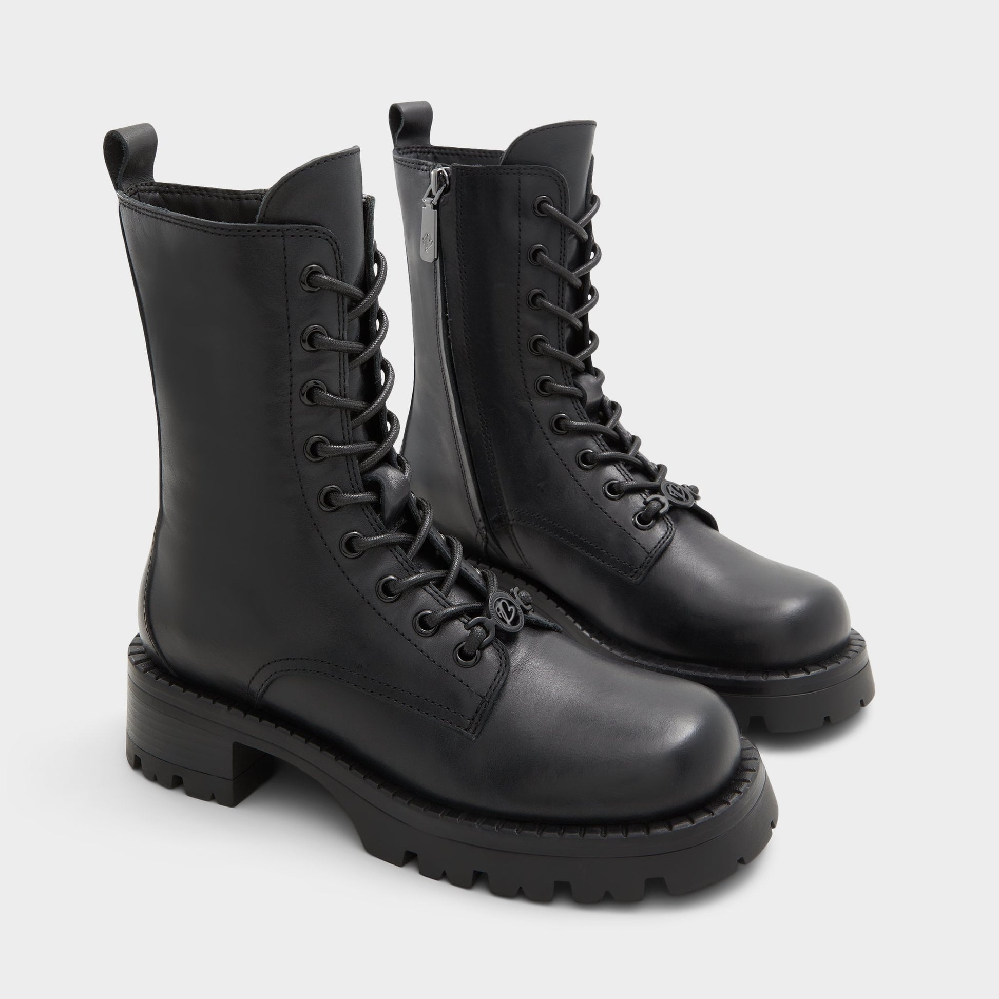 Highlighted view of a pair of Black Allea Combat ankle boots