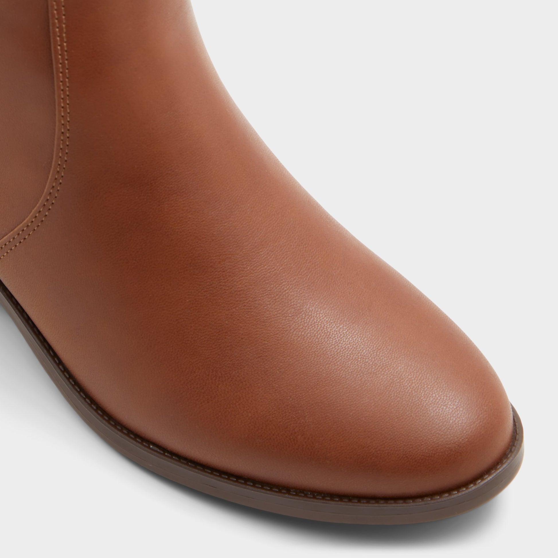 Close-up of the Cognac Tanerdee Knee-high boot