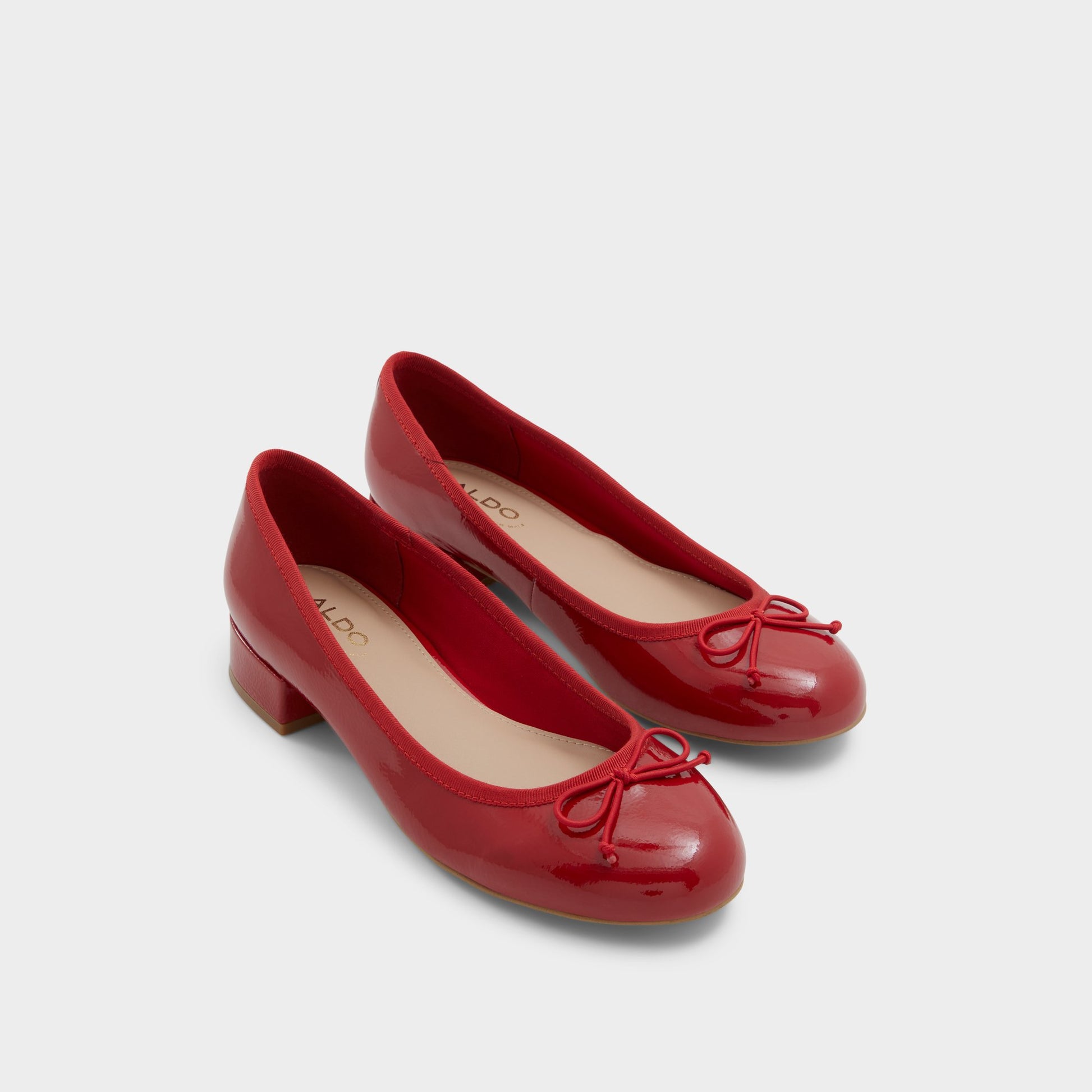 Highlighted view of a pair of Red Aliette Ballerinas