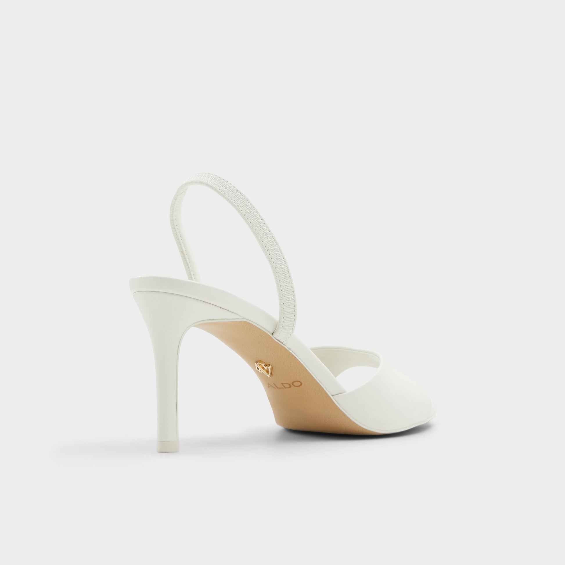 Three-quarter angle of White/Bone Aitana Slingback heeled sandal's back side