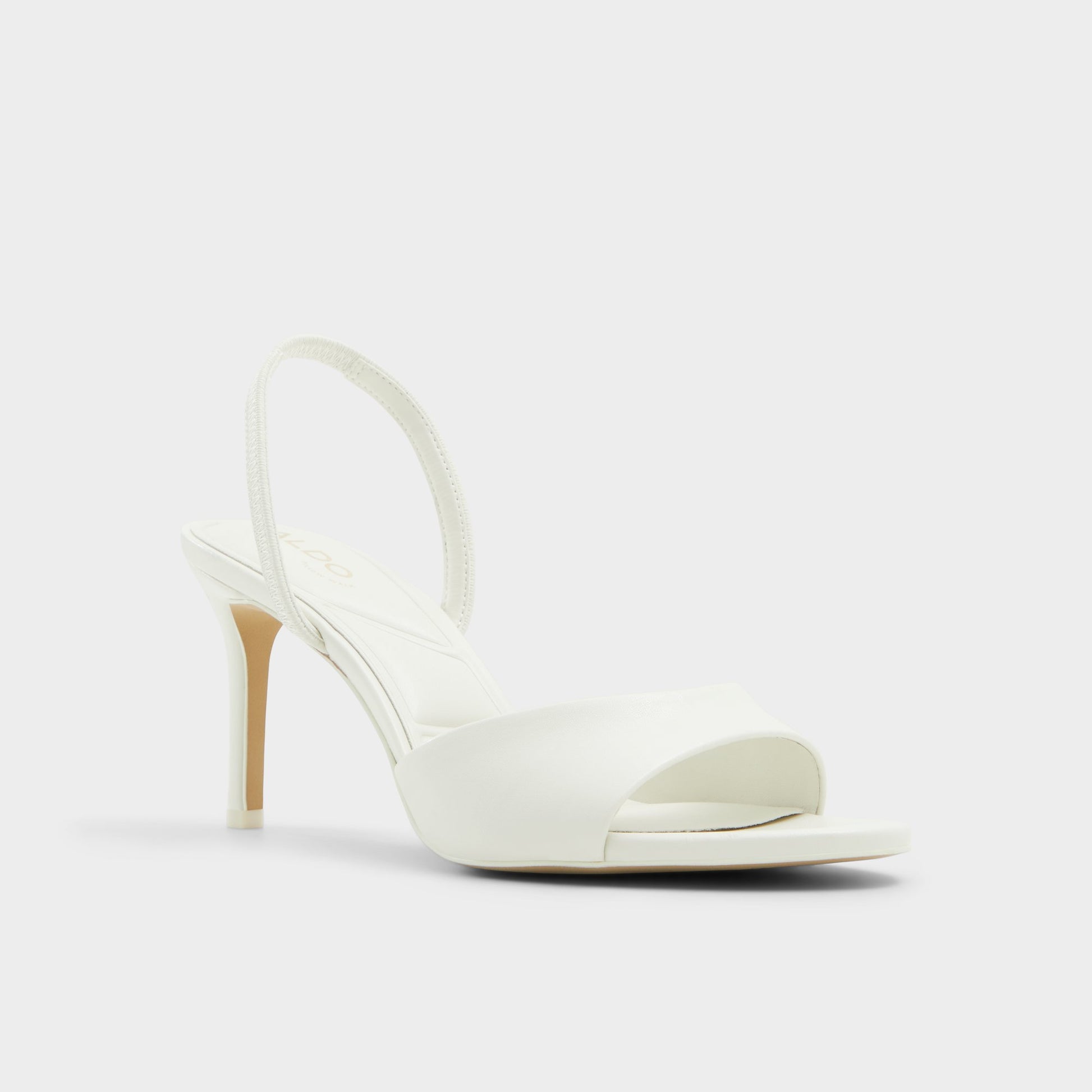 Three-quarter angle of White/Bone Aitana Slingback heeled sandal's front side