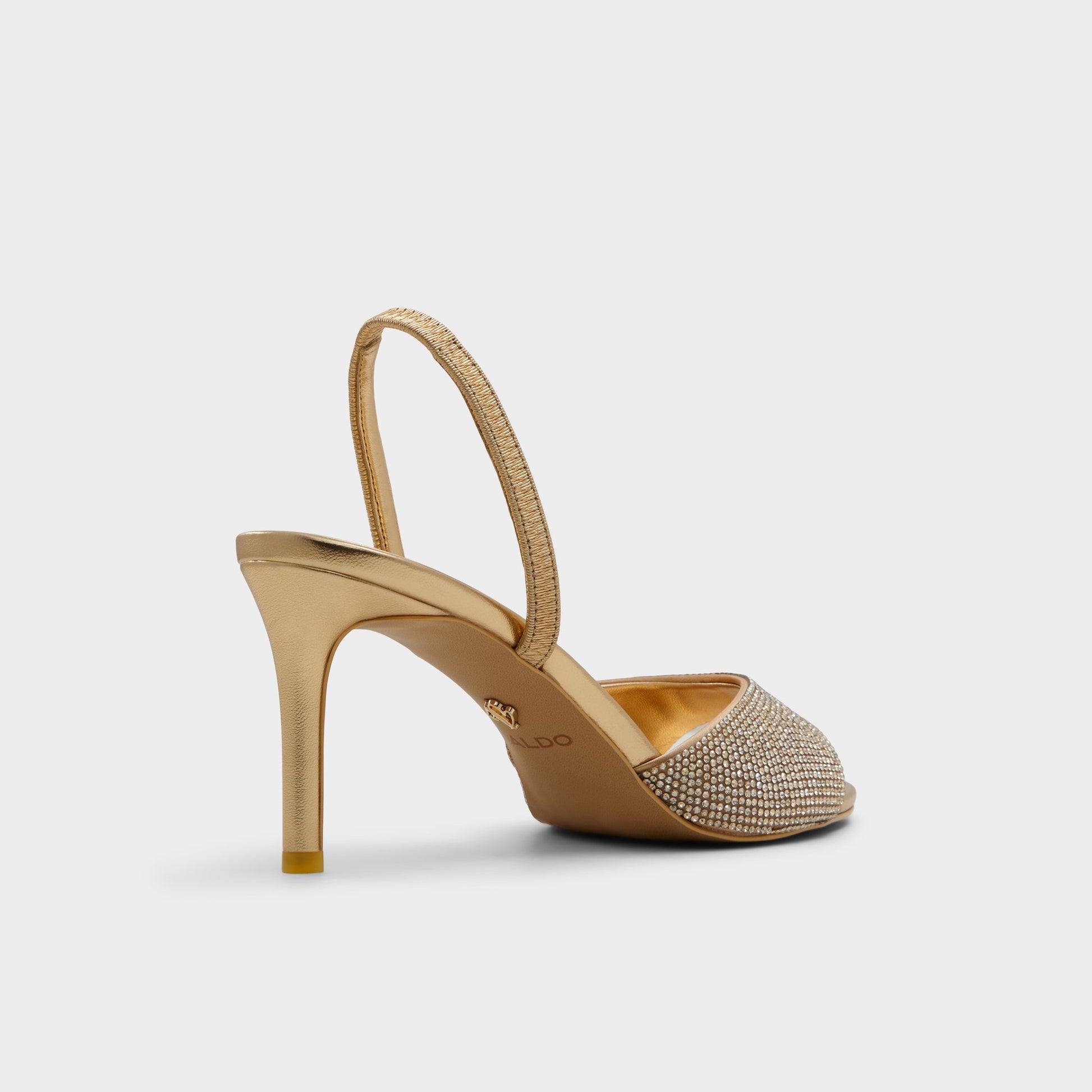 Three-quarter angle of Gold Aitana Slingback heeled sandal's back side