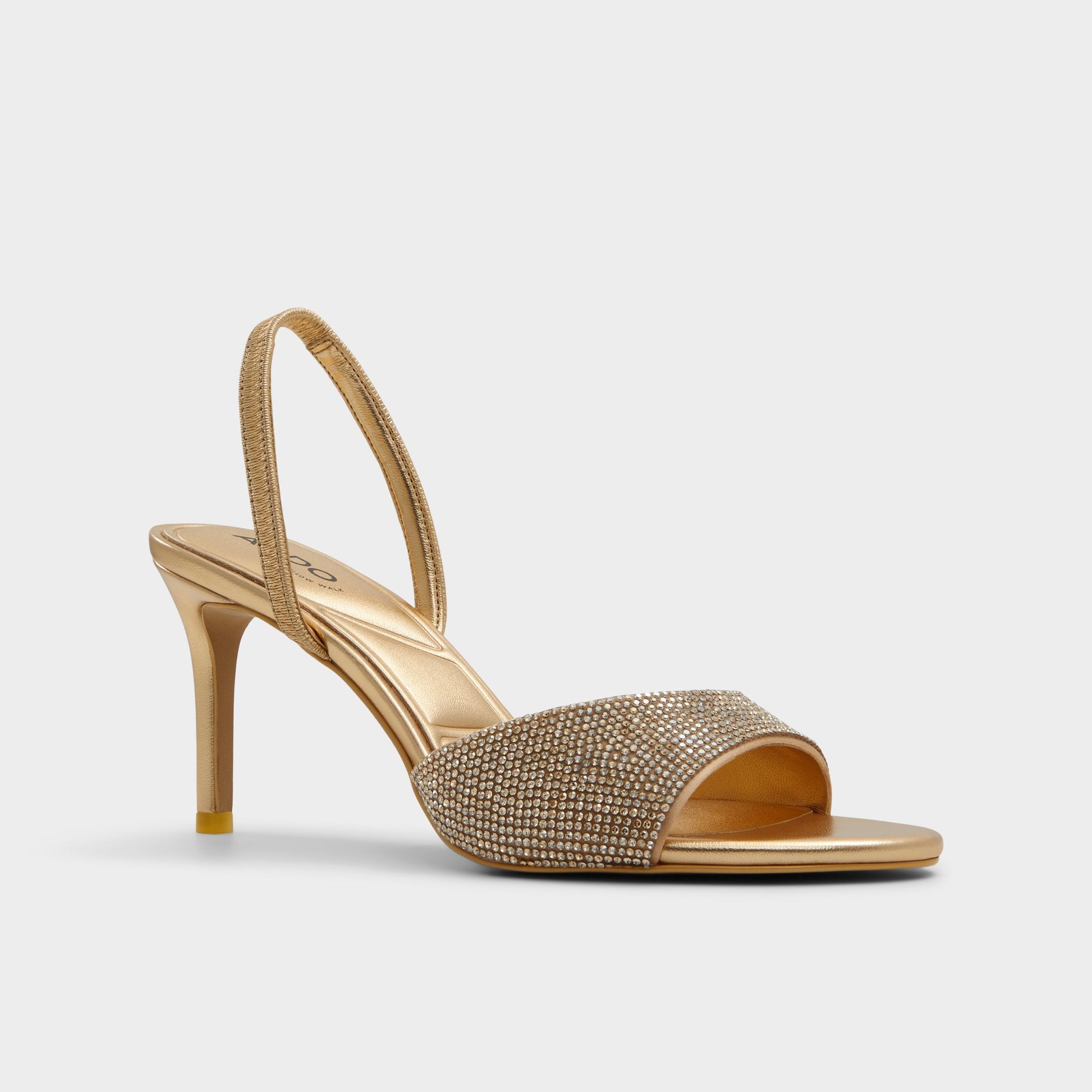 Three-quarter angle of Gold Aitana Slingback heeled sandal's front side