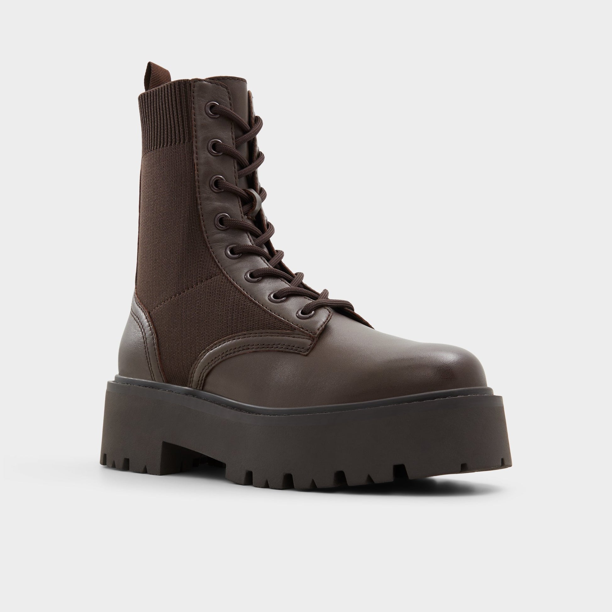 Three-quarter angle of Brown Overflow Talaleryknit Combat ankle boot's front side