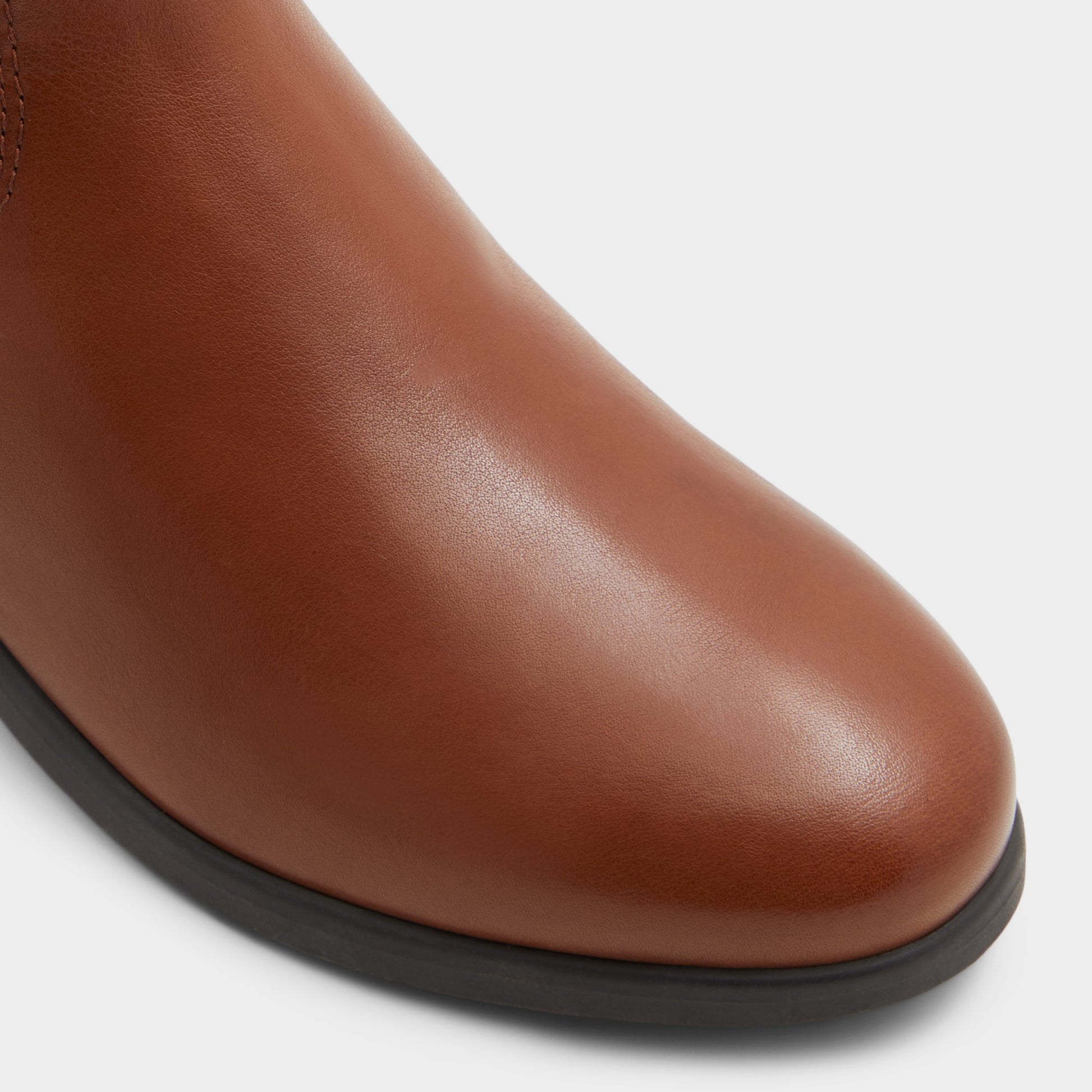 Close-up of the Cognac Wicoenitall Knee-high boot
