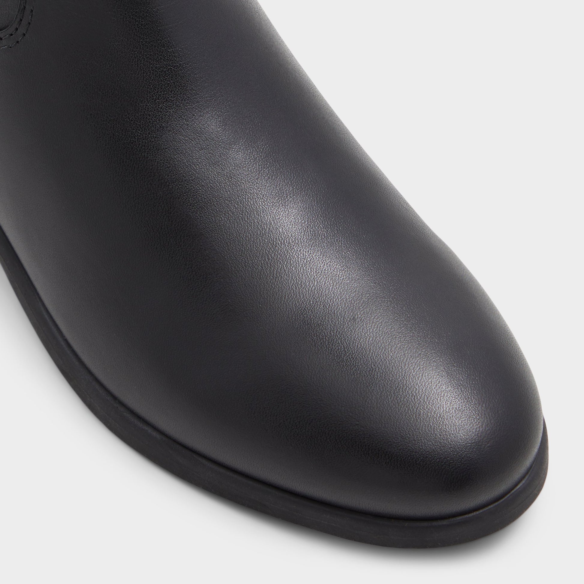 Close-up of the Black Wicoenitall Knee-high boot