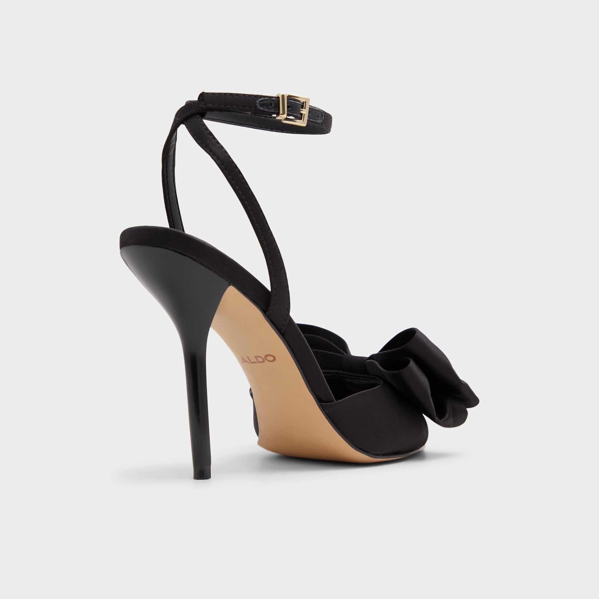 Three-quarter angle of Black Tinsletta Strappy heeled sandal's back side