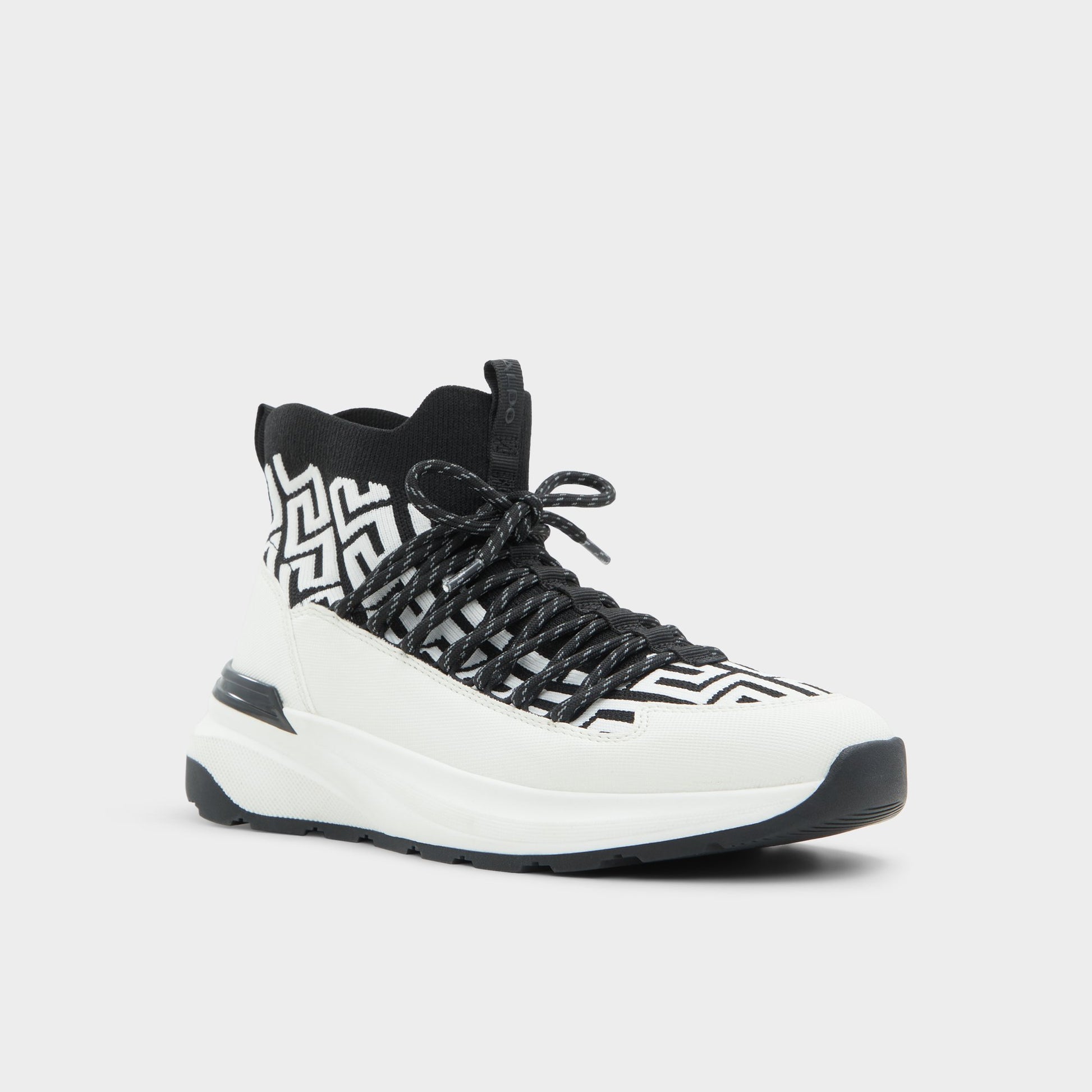 Three-quarter angle of White/Black Everlynn Jogger sneaker's front side