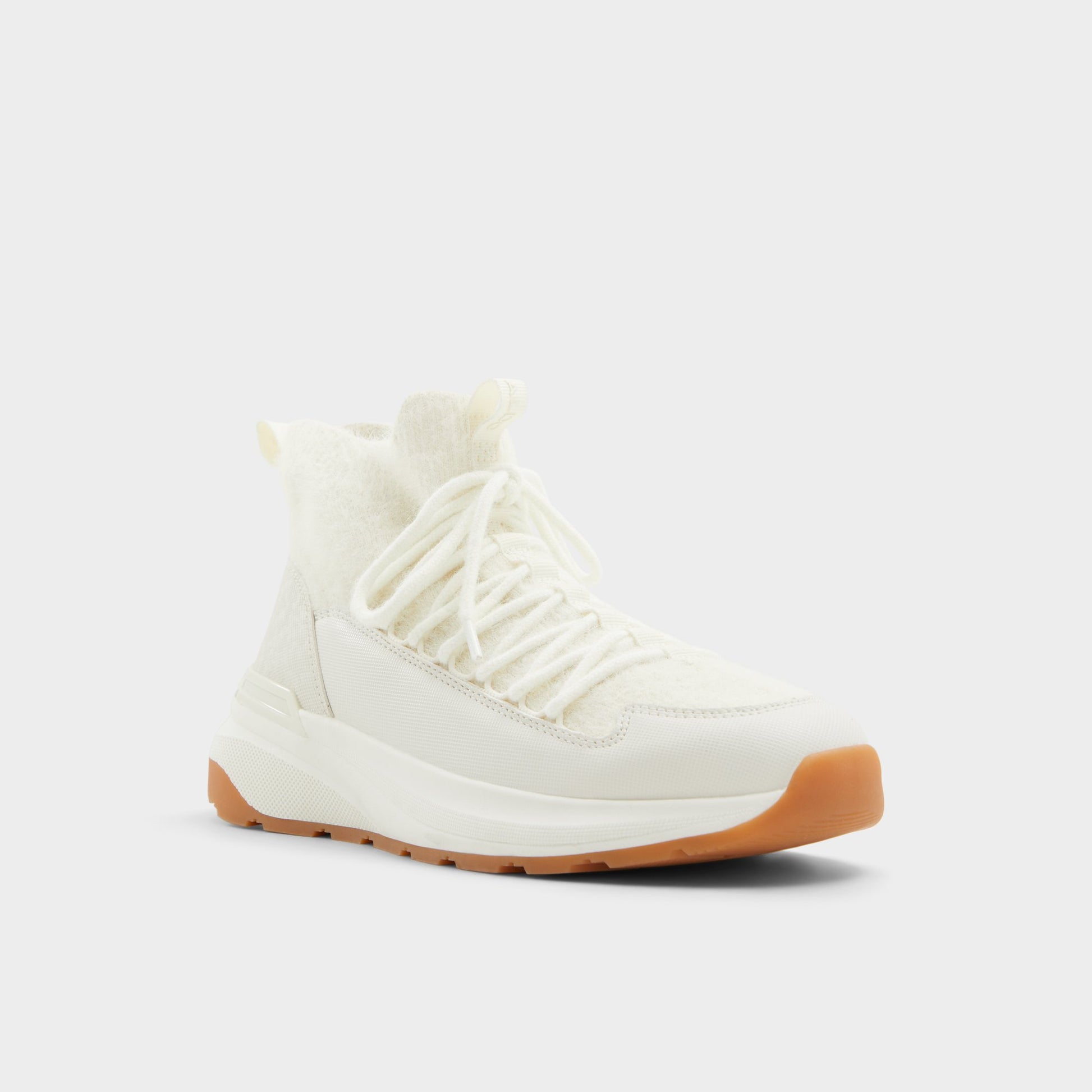 Three-quarter angle of Other White Everlynn Jogger sneaker's front side