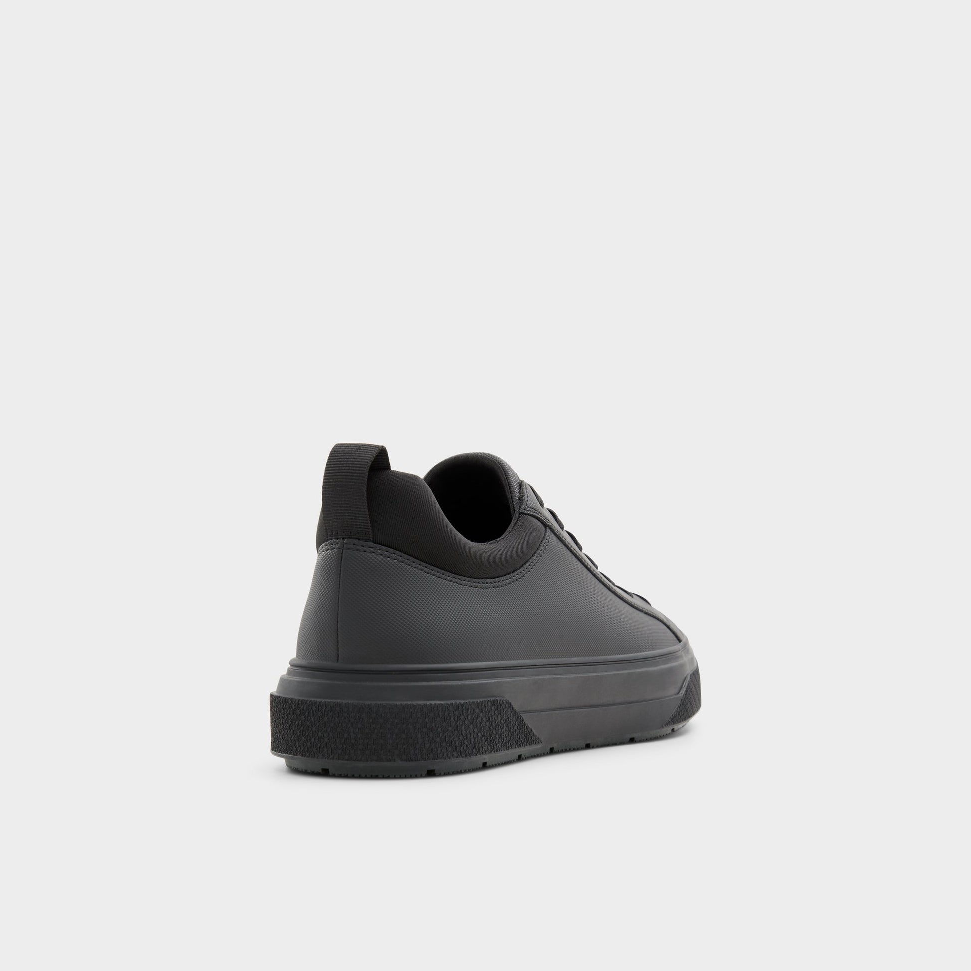 Three-quarter angle of Black Bas Low top sneaker's back side