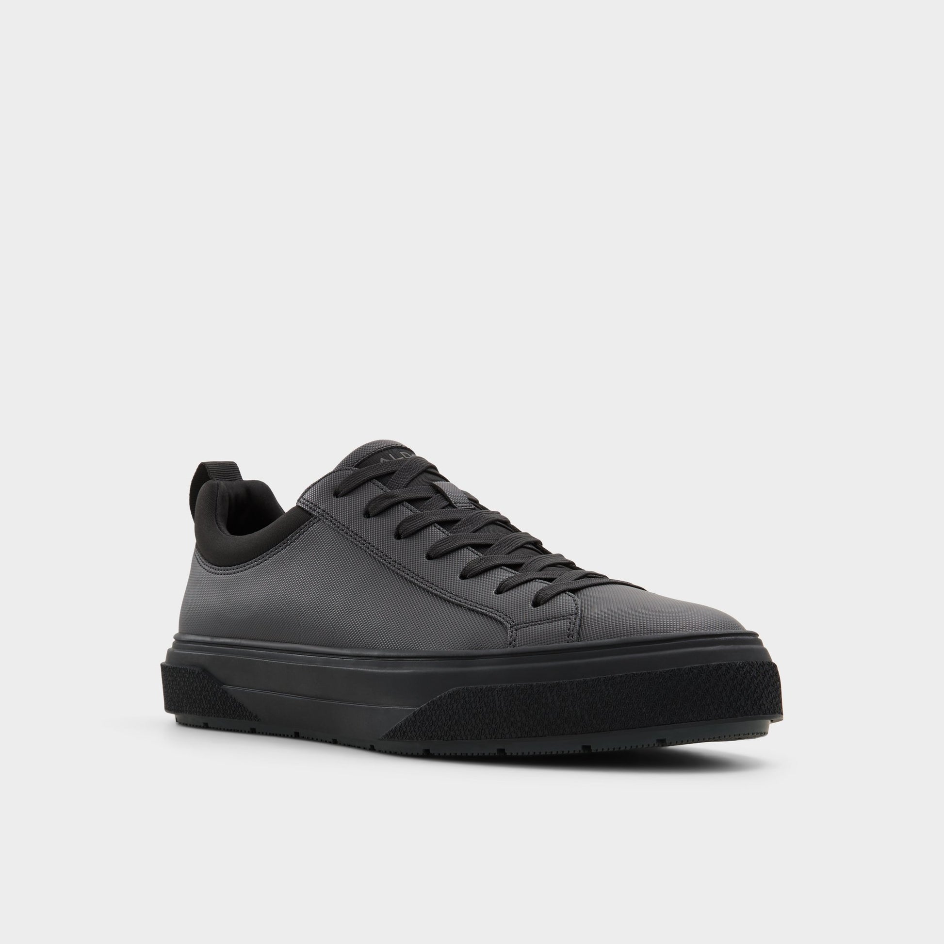 Three-quarter angle of Black Bas Low top sneaker's front side