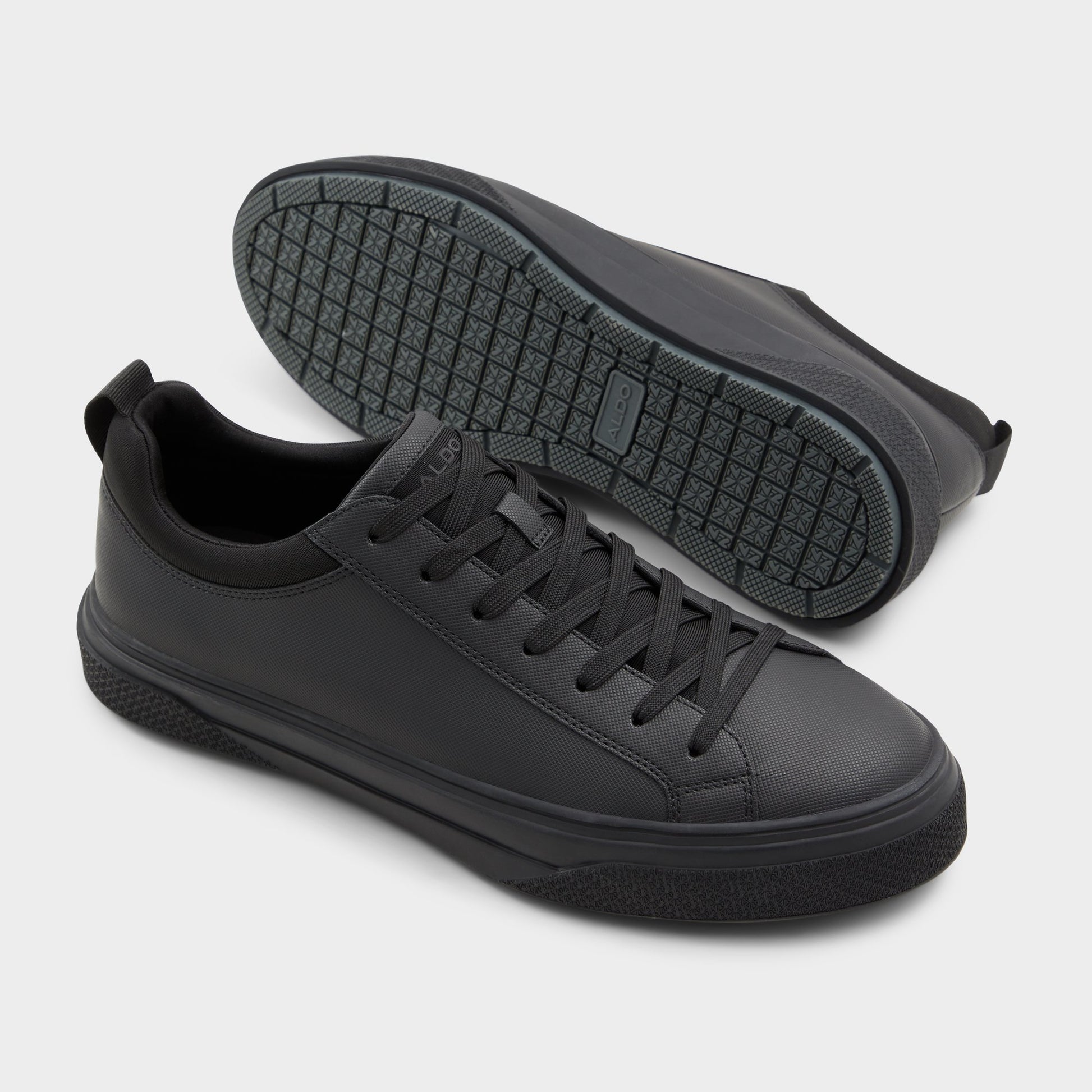 Highlighted view of a pair of Black Bas Low top sneakers