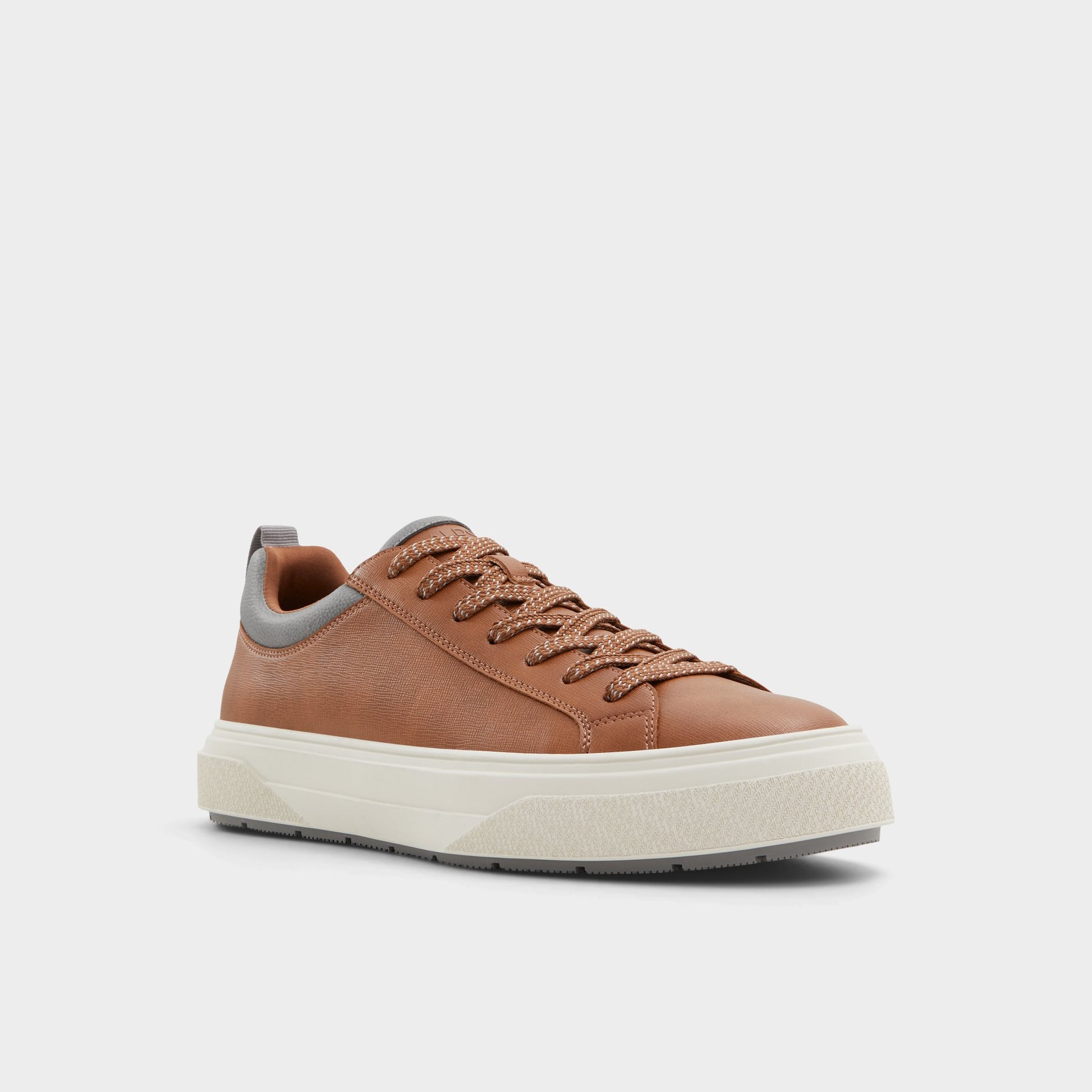 Three-quarter angle of Light Brown Bas Low top sneaker's front side