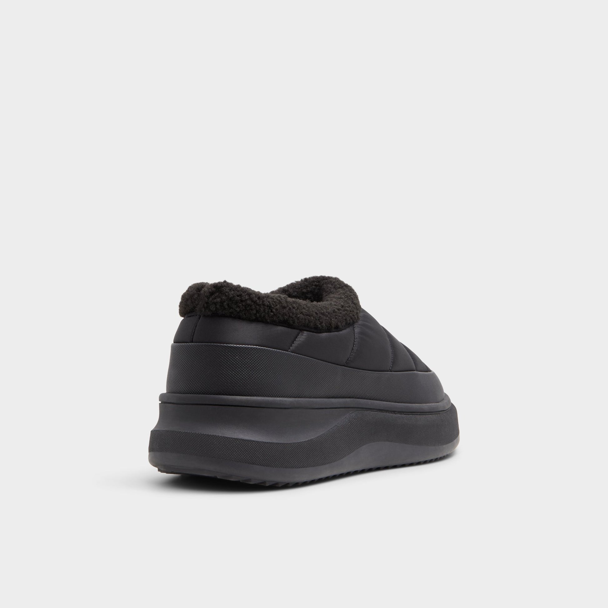 Three-quarter angle of Black Pike Mule sneaker's back side