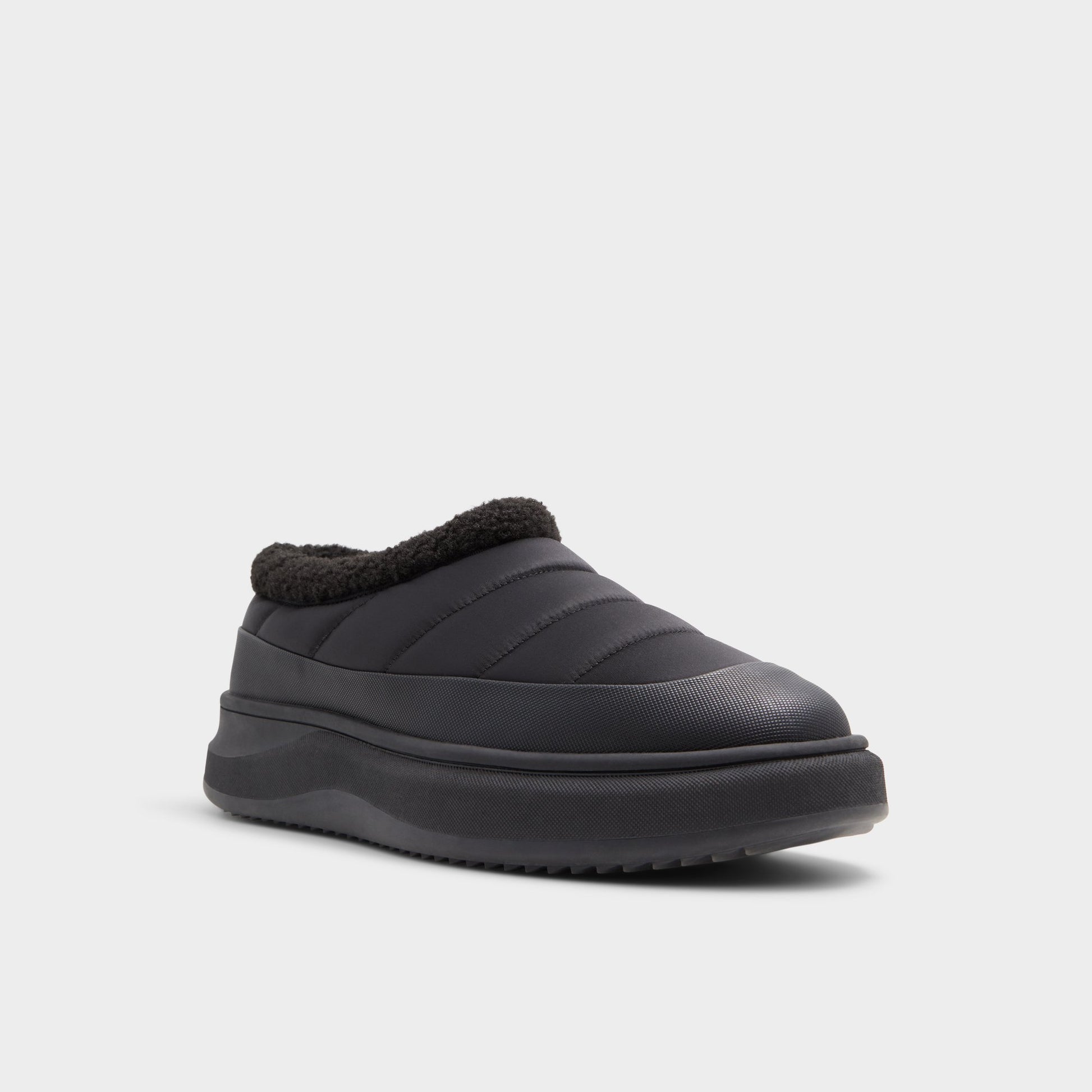 Three-quarter angle of Black Pike Mule sneaker's front side