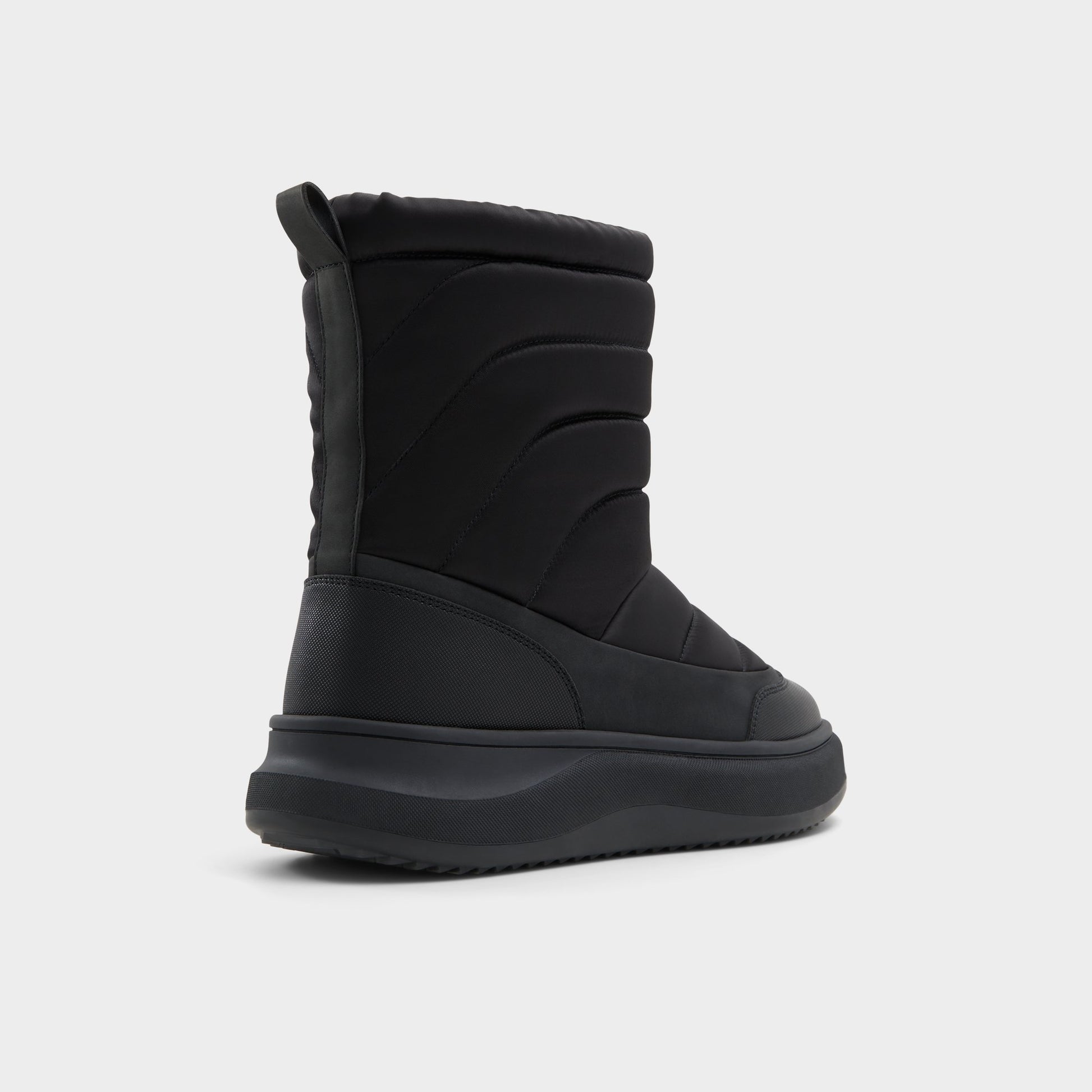 Three-quarter angle of Black Fucino Chelsea boot's back side
