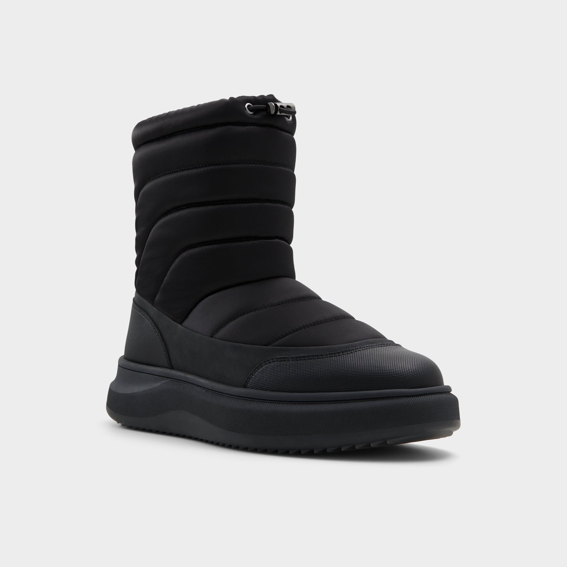 Three-quarter angle of Black Fucino Chelsea boot's front side