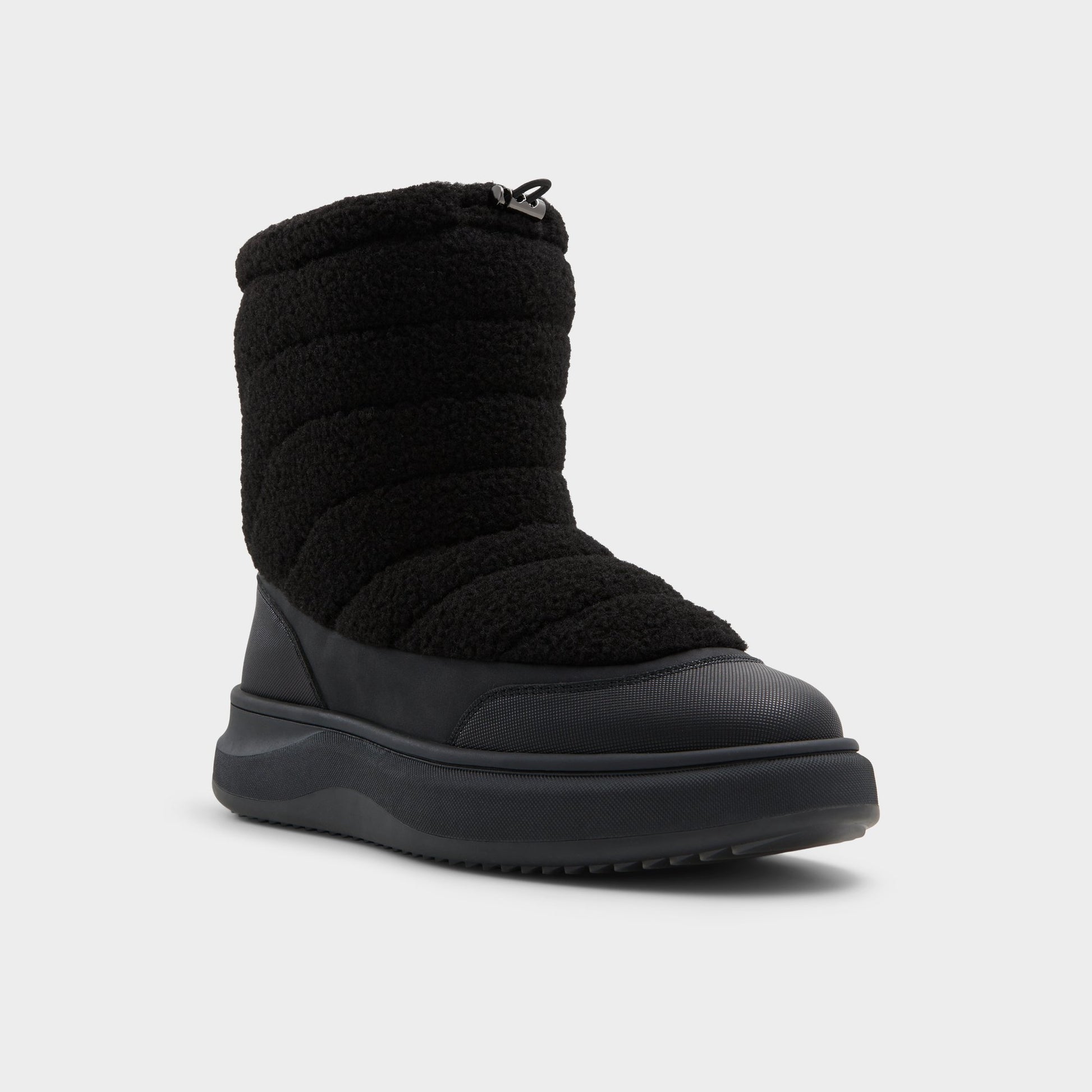 Three-quarter angle of Black Fucino Chelsea boot's front side