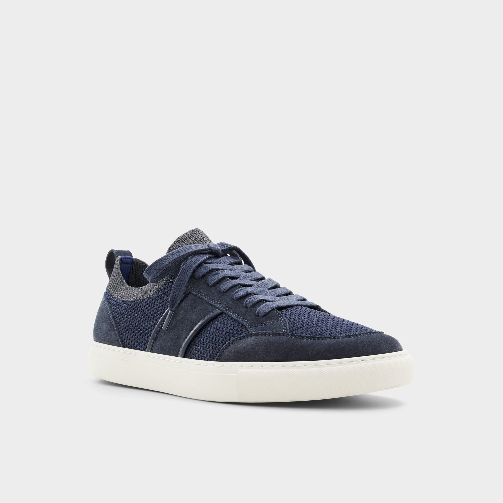Three-quarter angle of Navy Owens Low top sneaker's front side
