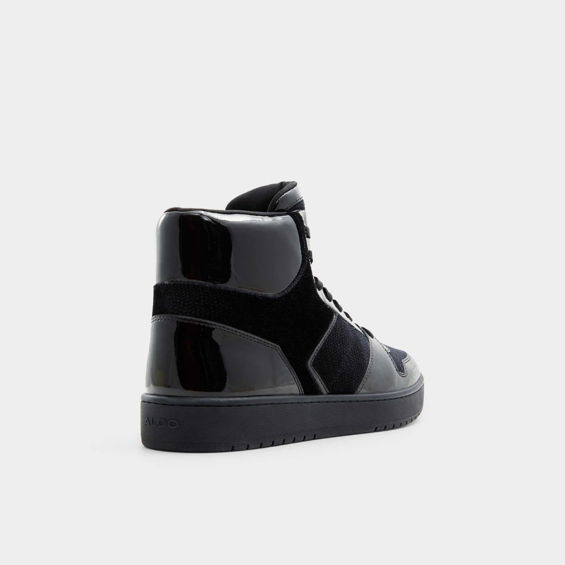 Three-quarter angle of Black Jaden High top sneaker's back side