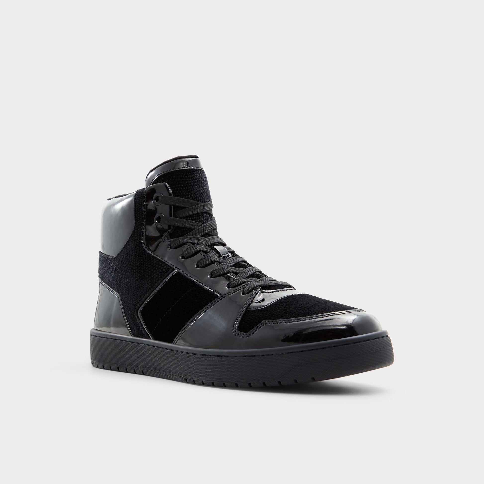 Three-quarter angle of Black Jaden High top sneaker's front side
