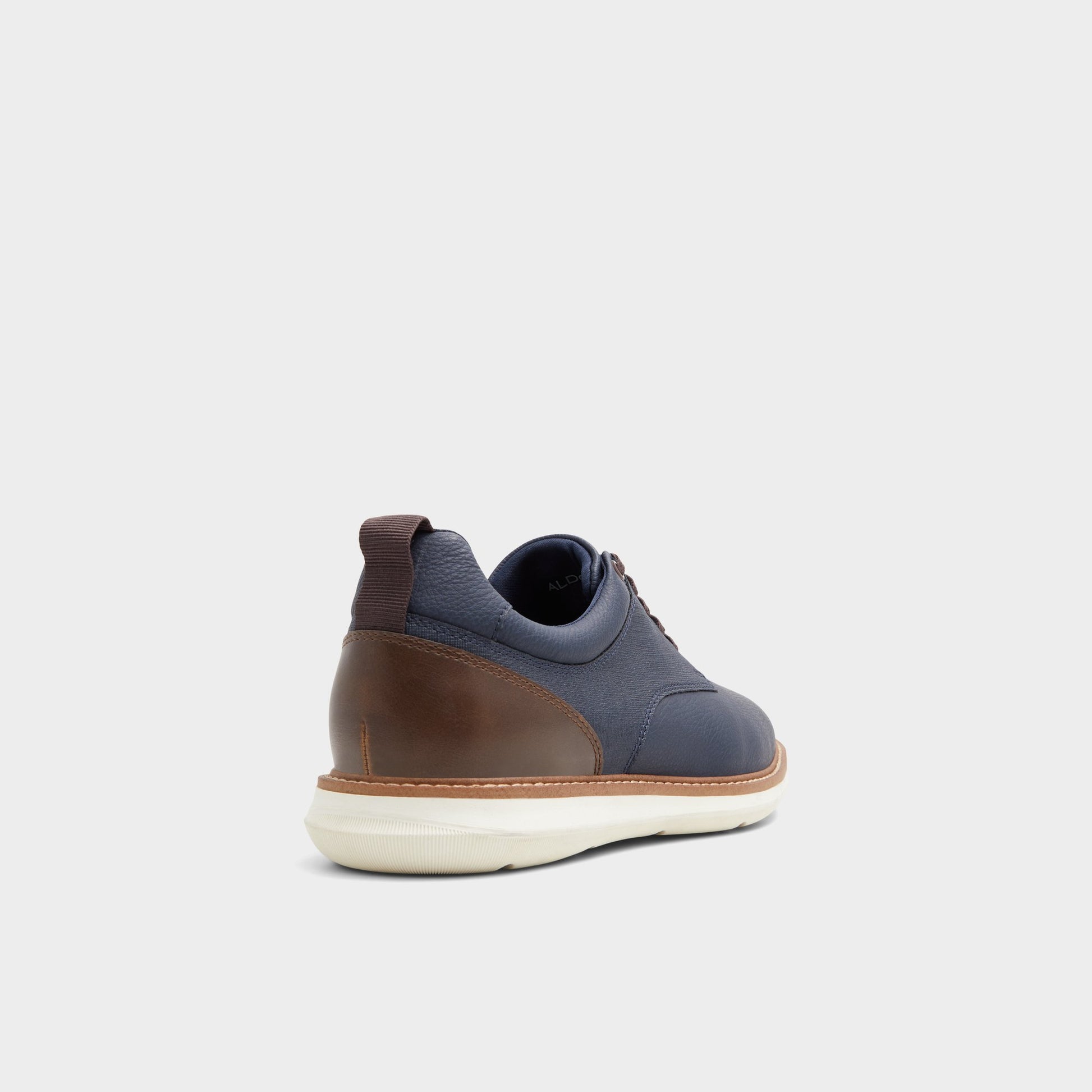 Three-quarter angle of Navy Preth Oxford shoe's back side