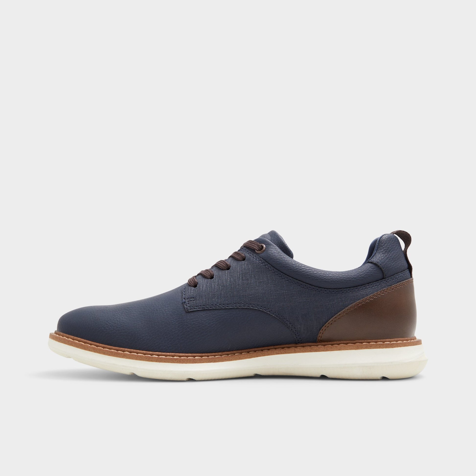 Side view of Navy Preth Oxford shoe