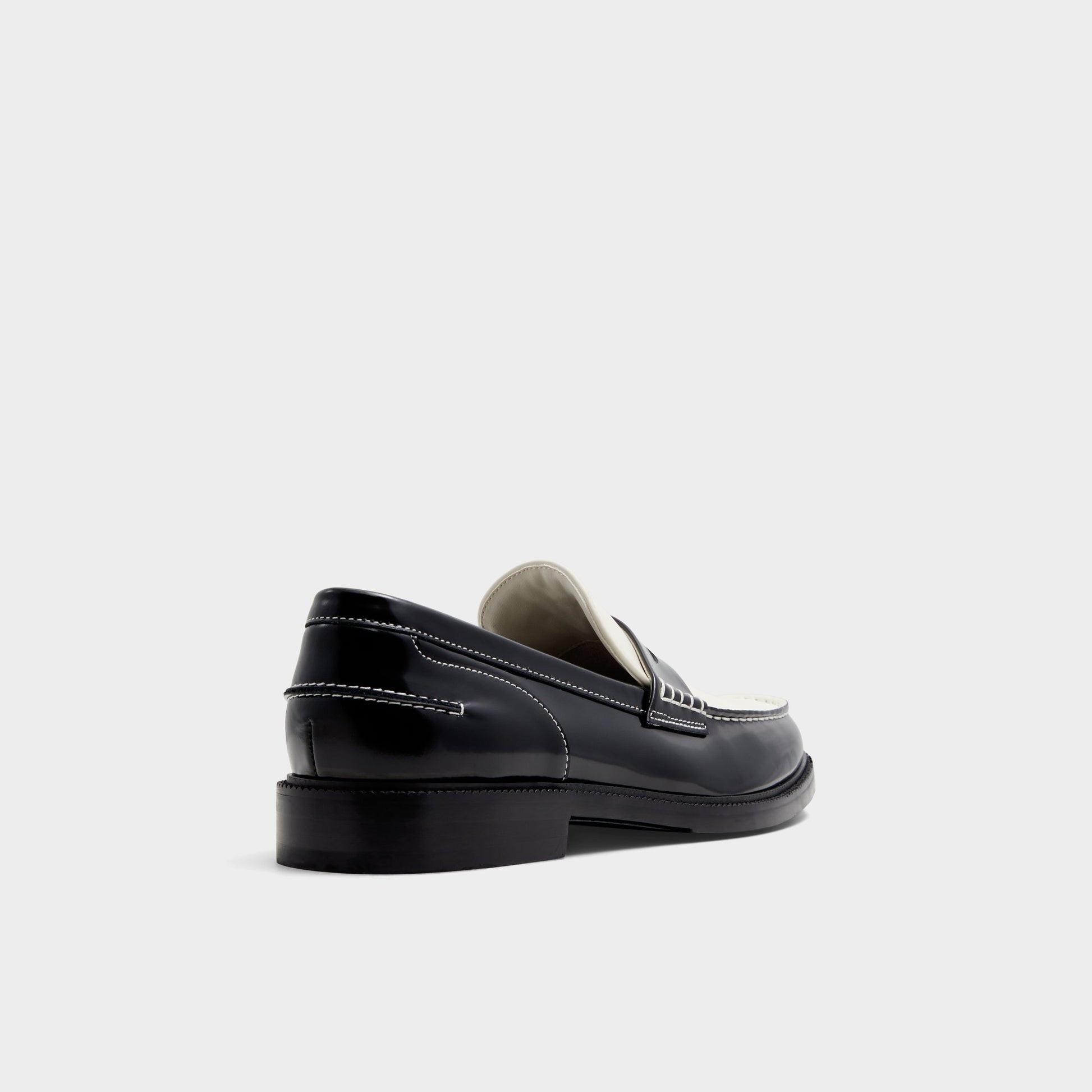 Three-quarter angle of Black/White Kieran Loafer's back side