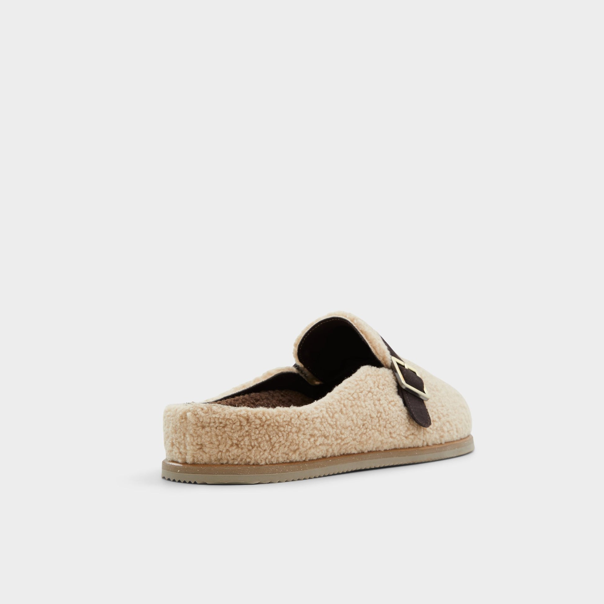 Three-quarter angle of Beige Kellan Mule's back side