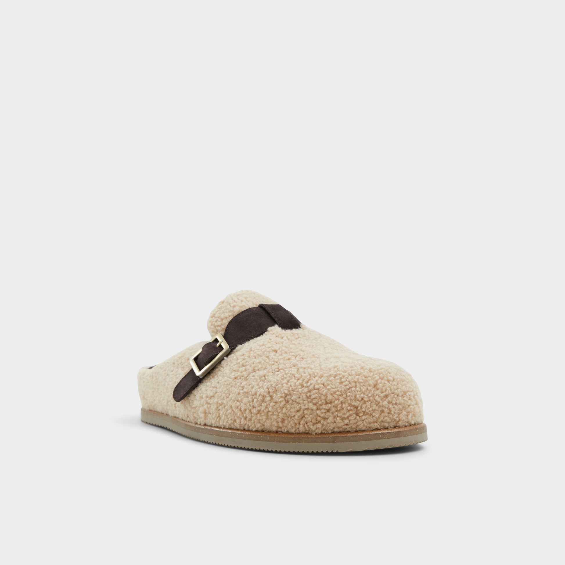 Three-quarter angle of Beige Kellan Mule's front side