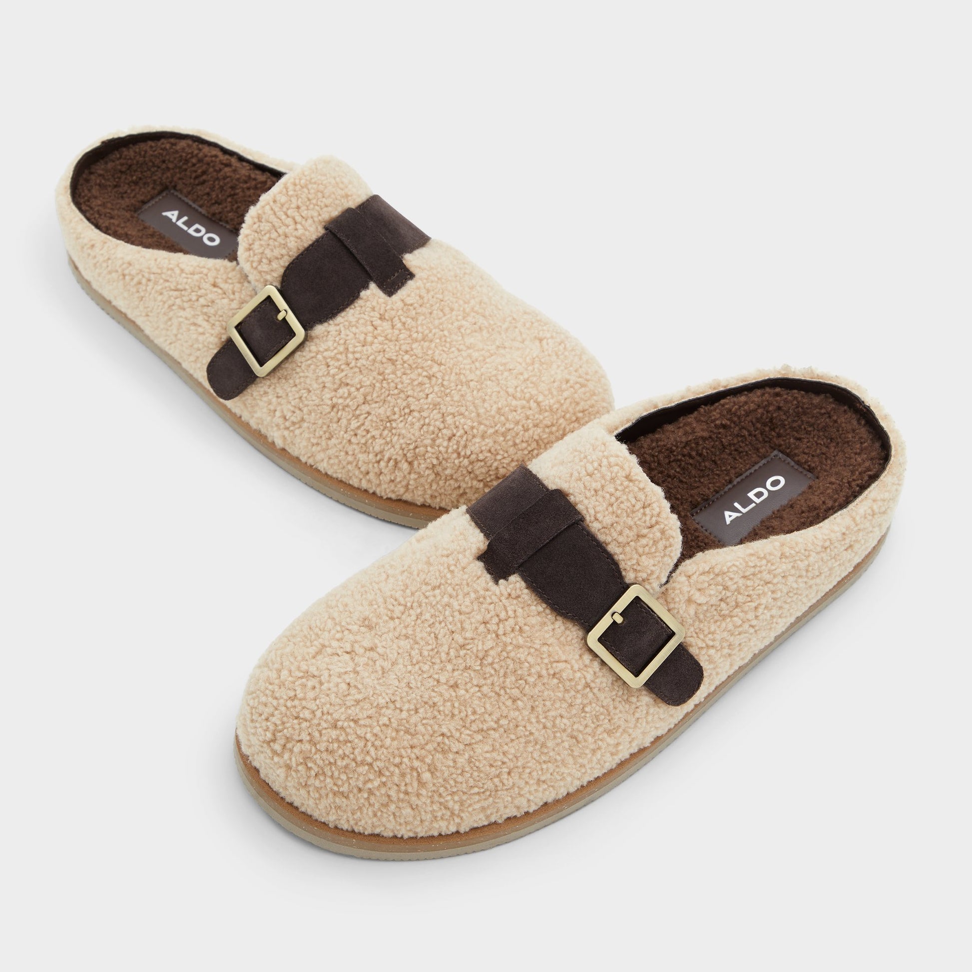 Highlighted view of a pair of Beige Kellan Mules