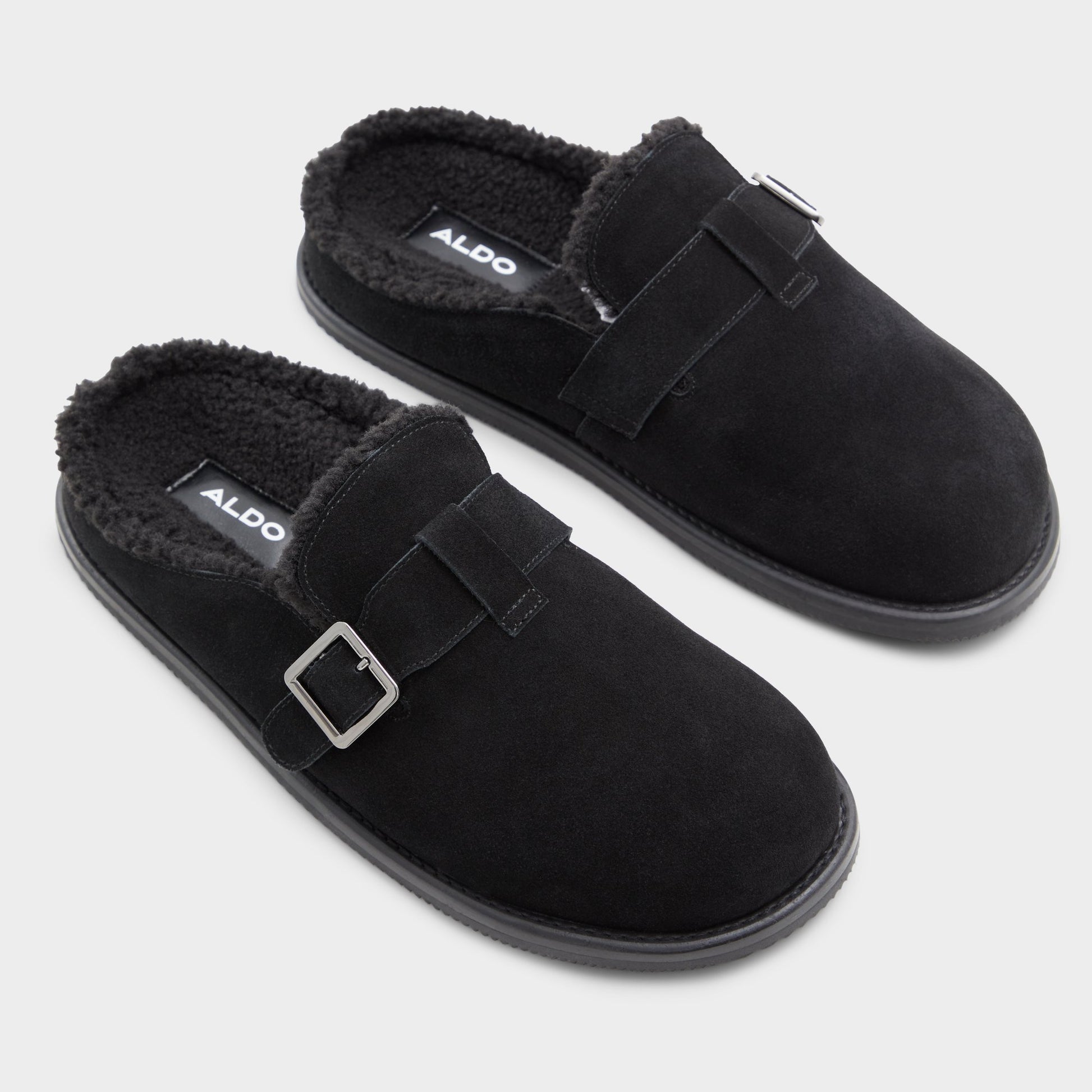 Highlighted view of a pair of Black Kellan Mules
