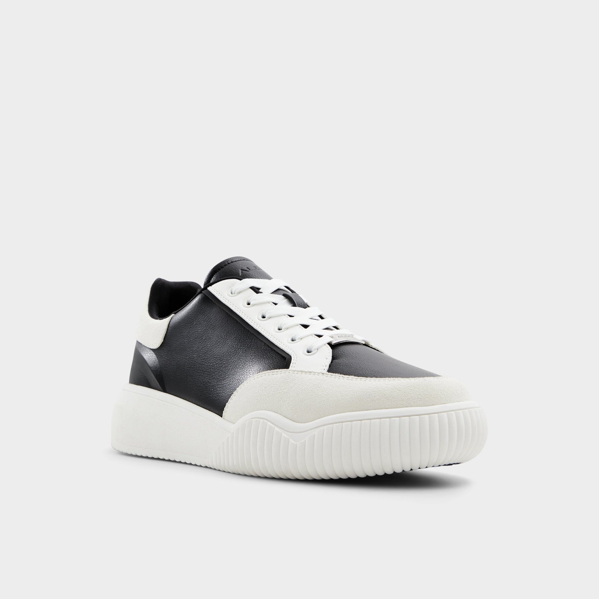 Three-quarter angle of Open Black Kylian Low top sneaker's front side