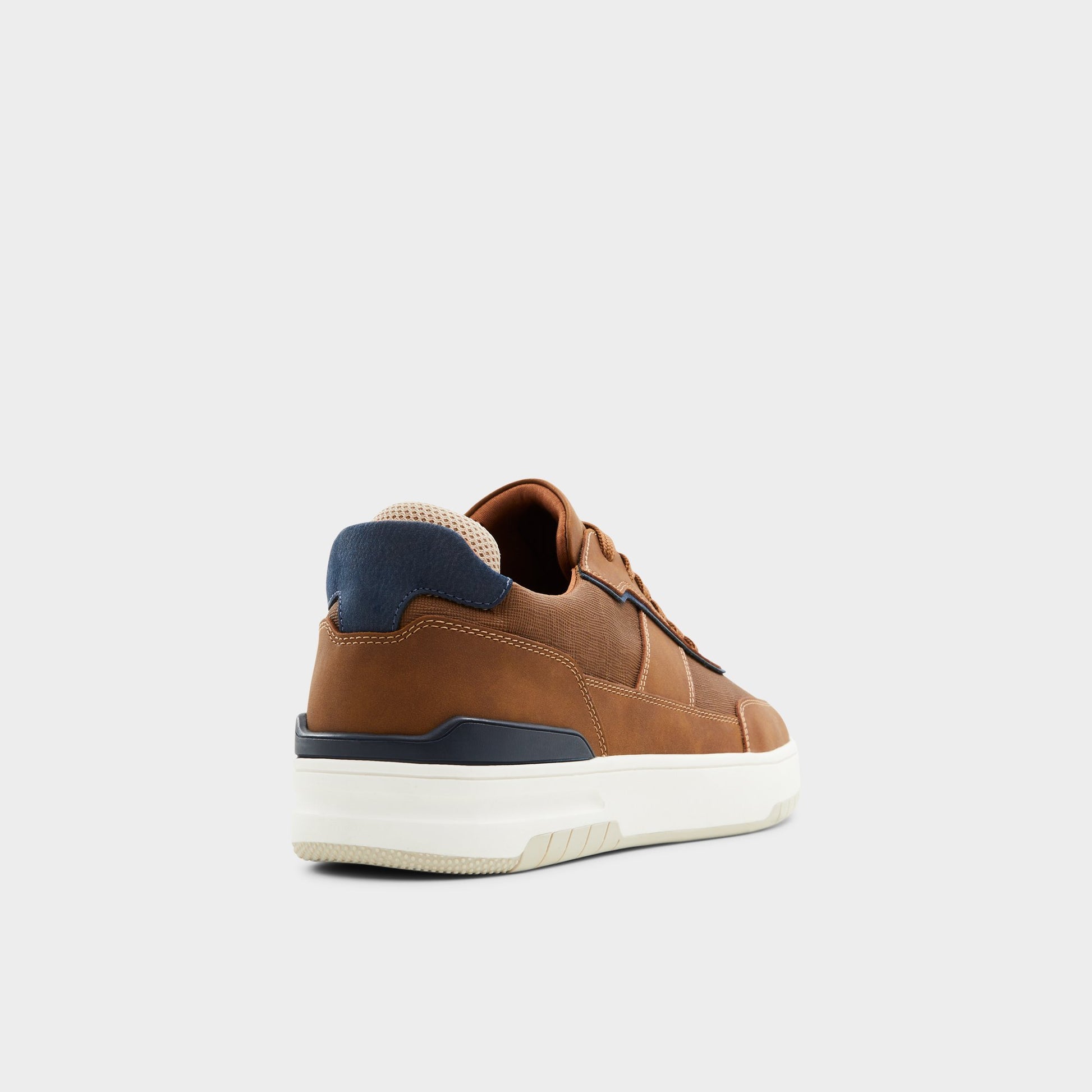 Three-quarter angle of Cognac Creed Low top sneaker's back side