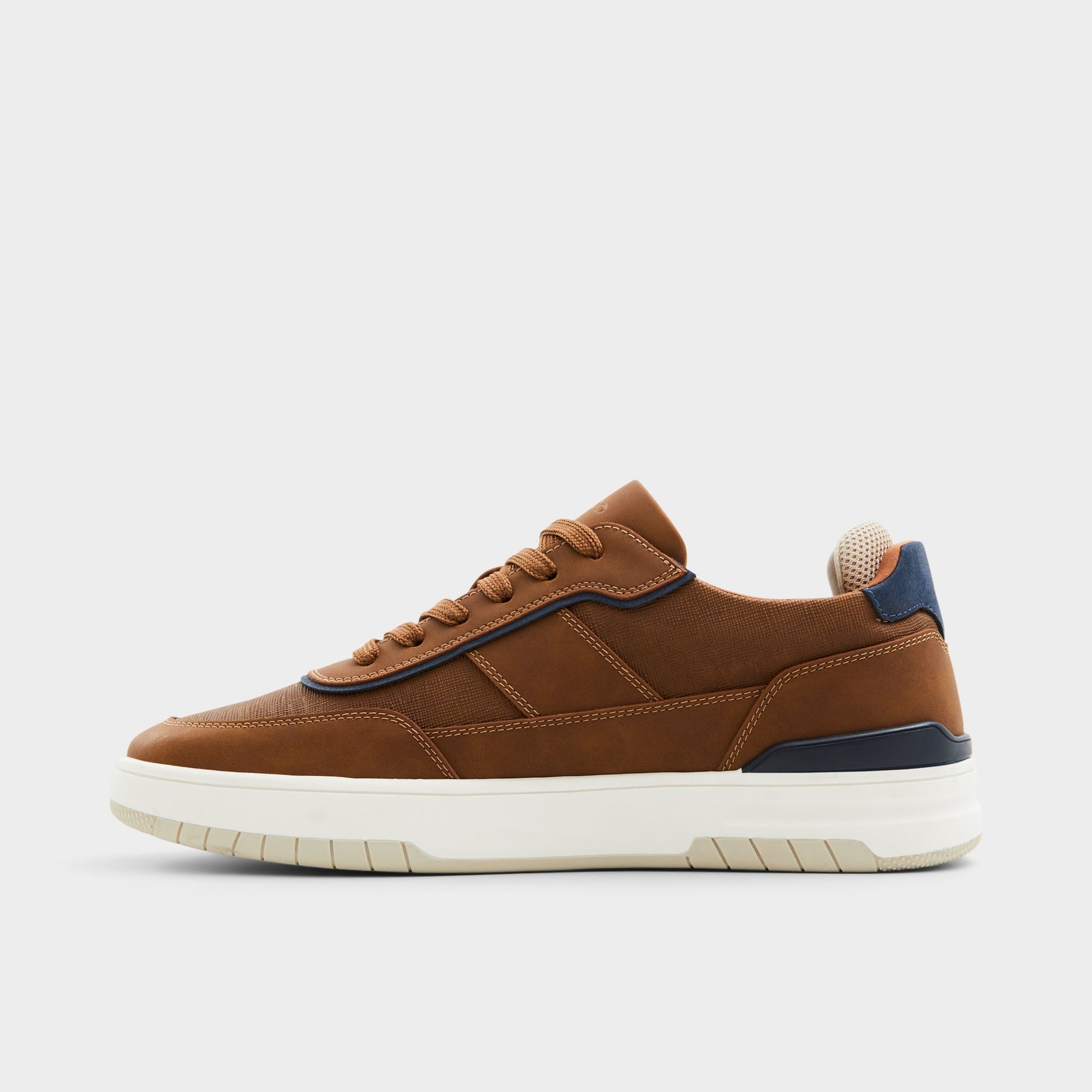 Side view of Cognac Creed Low top sneaker