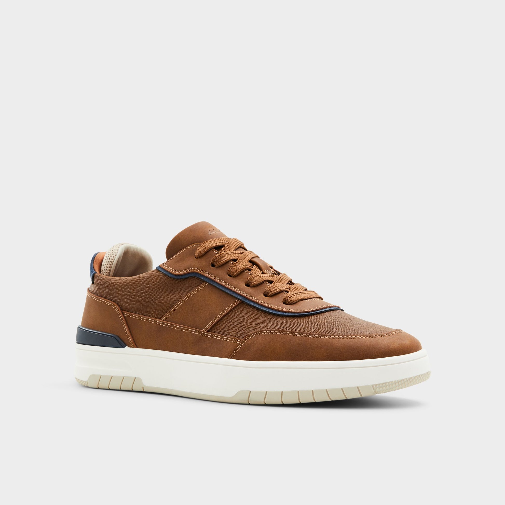 Three-quarter angle of Cognac Creed Low top sneaker's front side