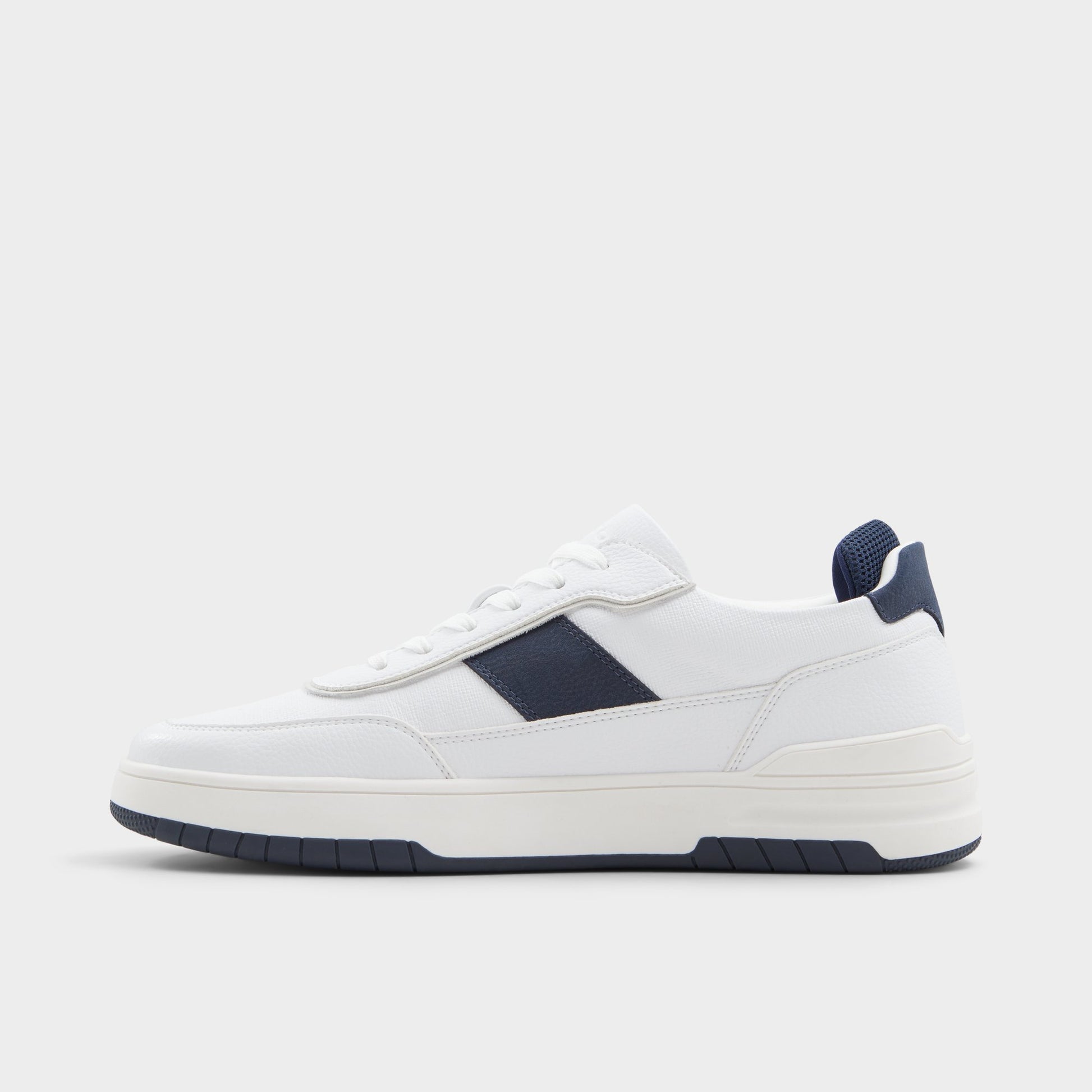 Side view of White Creed Low top sneaker