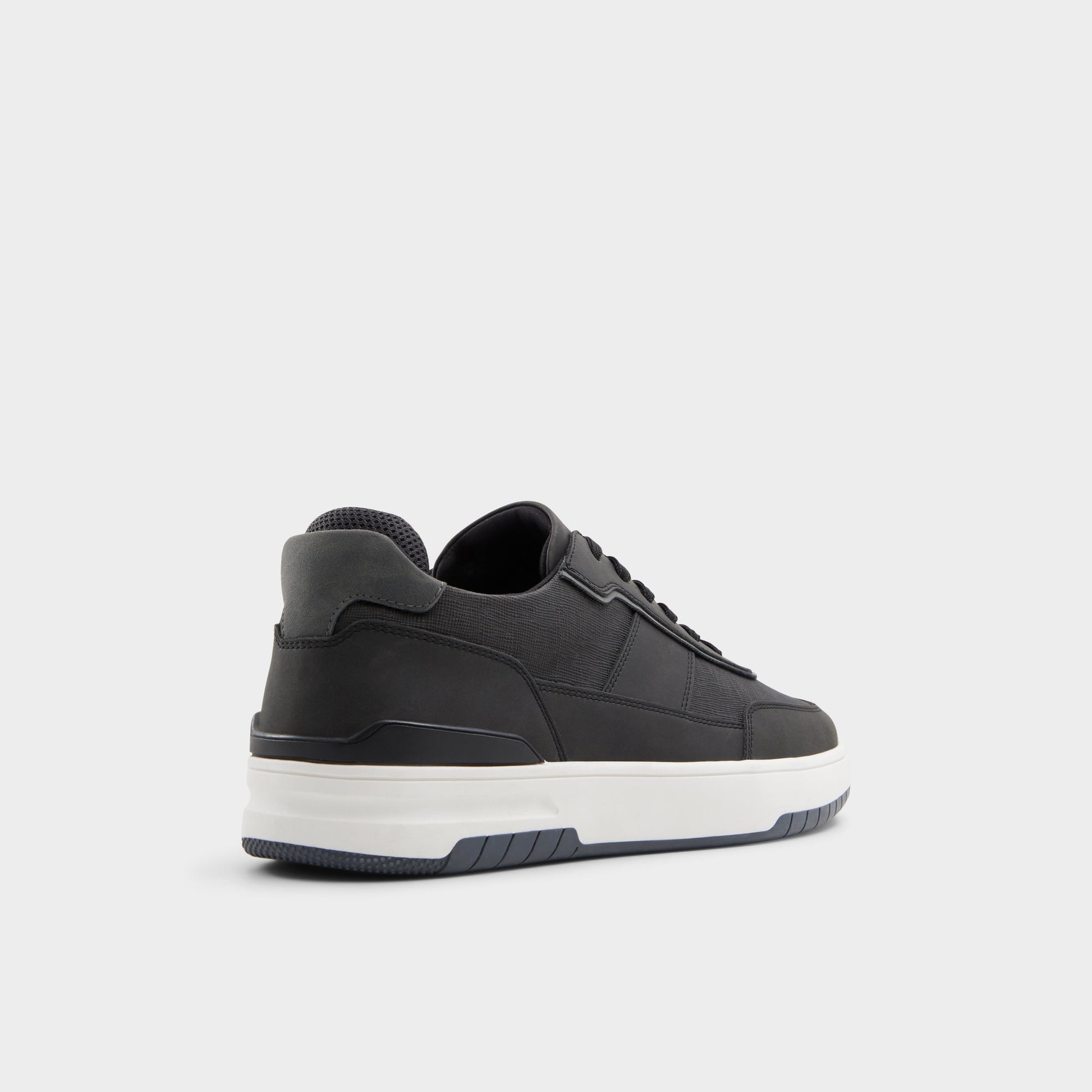 Three-quarter angle of Black Creed Low top sneaker's back side