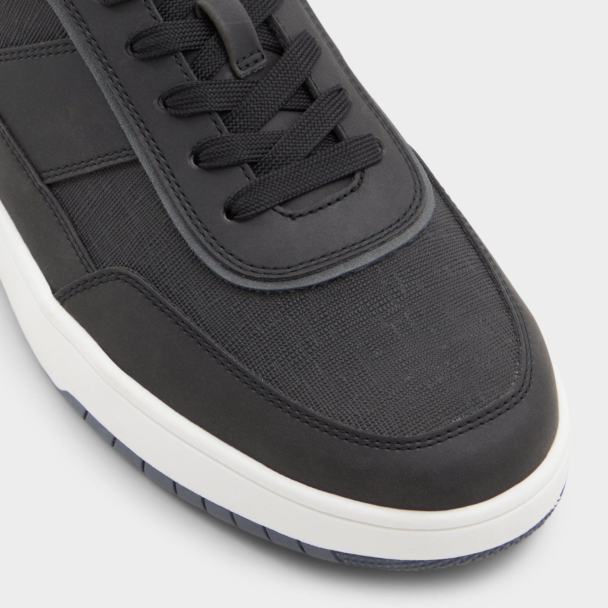 Close-up of the Black Creed Low top sneaker