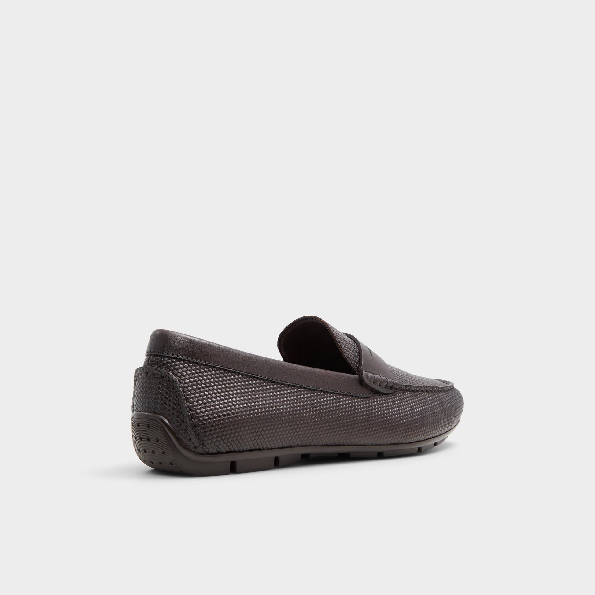 Three-quarter angle of Dark Brown Discourse Driving shoe's back side