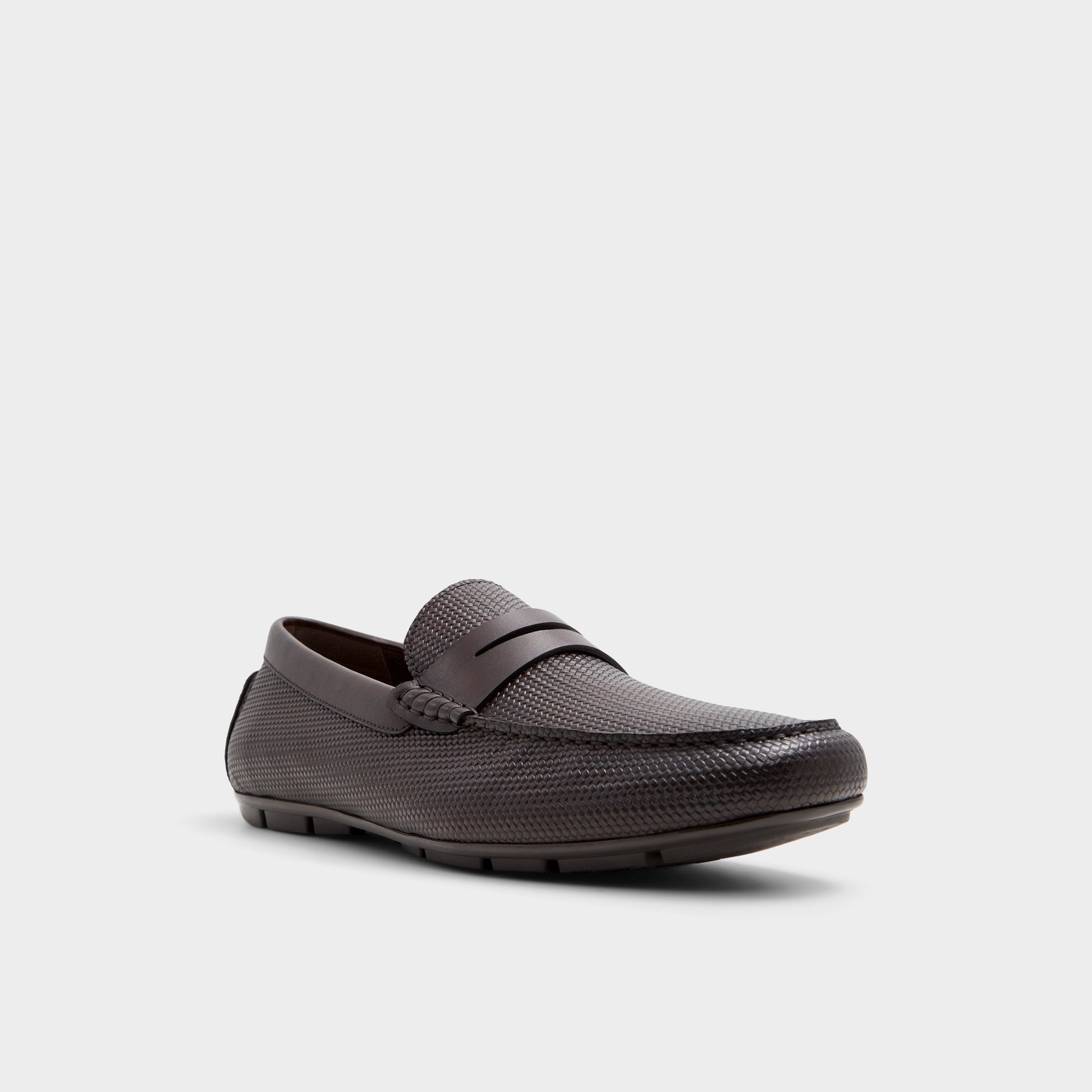 Three-quarter angle of Dark Brown Discourse Driving shoe's front side