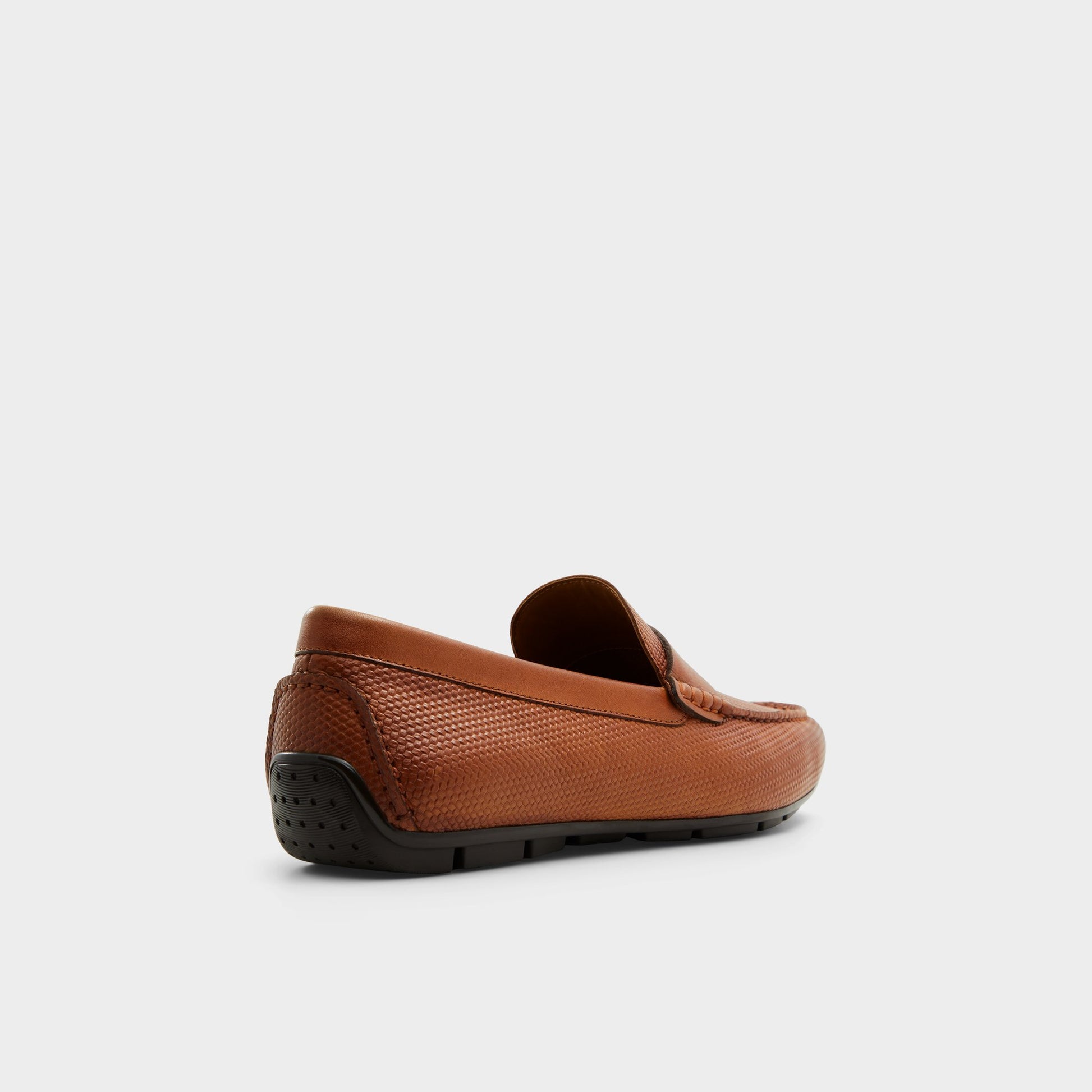 Three-quarter angle of Other Brown Discourse Driving shoe's back side
