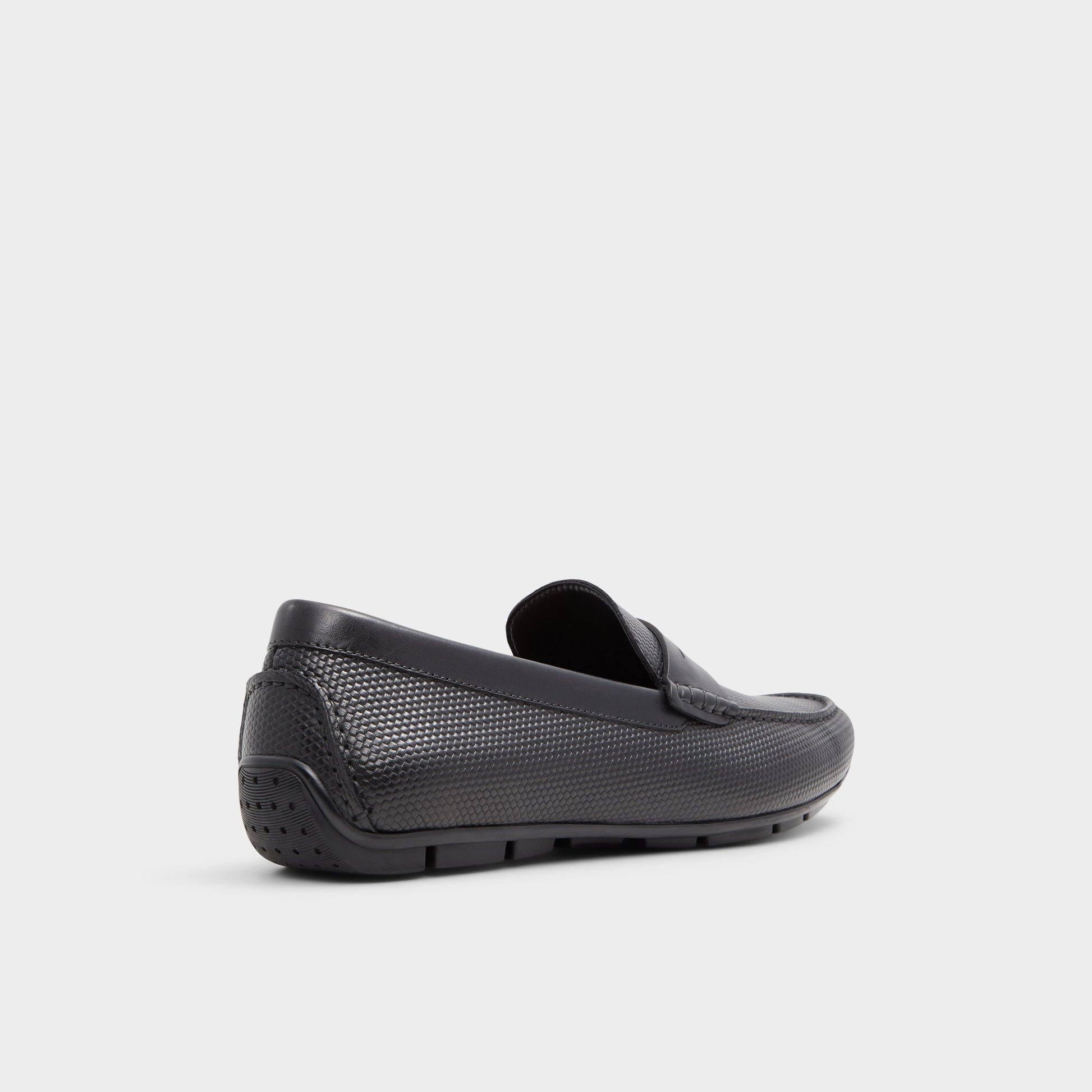 Three-quarter angle of Black Discourse Driving shoe's back side